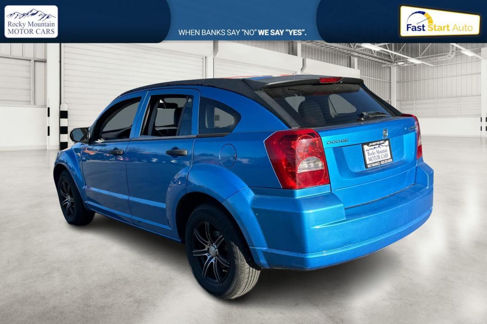 2009 Blue Dodge Caliber SE (1B3HB28A69D) with an 2.0L L4 DOHC 16V engine, Automatic, CVT transmission, located at 344 S Washington Blvd, Ogden, UT, 84404, (801) 399-1799, 41.255482, -111.970848 - Photo#5