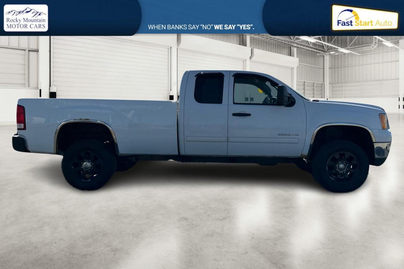 2011 White GMC Sierra 3500HD SLE Ext. Cab Long Box 4WD (1GT523CG7BZ) with an 6.0L V8 OHV 16V FFV engine, 6-Speed Automatic transmission, located at 767 S State Road, Pleasant Grove, UT, 84062, (801) 785-1058, 40.354839, -111.736687 - Photo#1