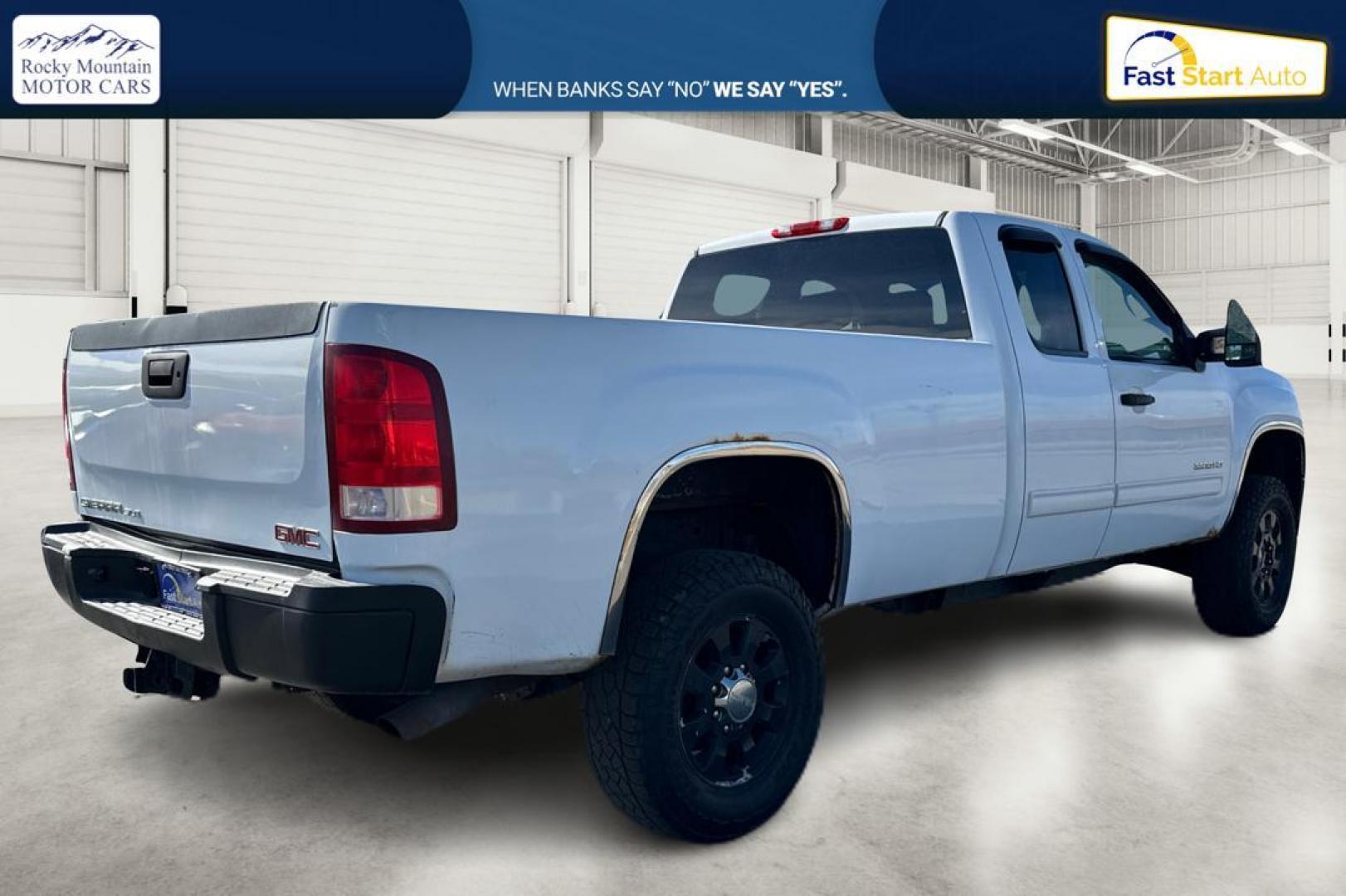 2011 White GMC Sierra 3500HD SLE Ext. Cab Long Box 4WD (1GT523CG7BZ) with an 6.0L V8 OHV 16V FFV engine, 6-Speed Automatic transmission, located at 767 S State Road, Pleasant Grove, UT, 84062, (801) 785-1058, 40.354839, -111.736687 - Photo#2