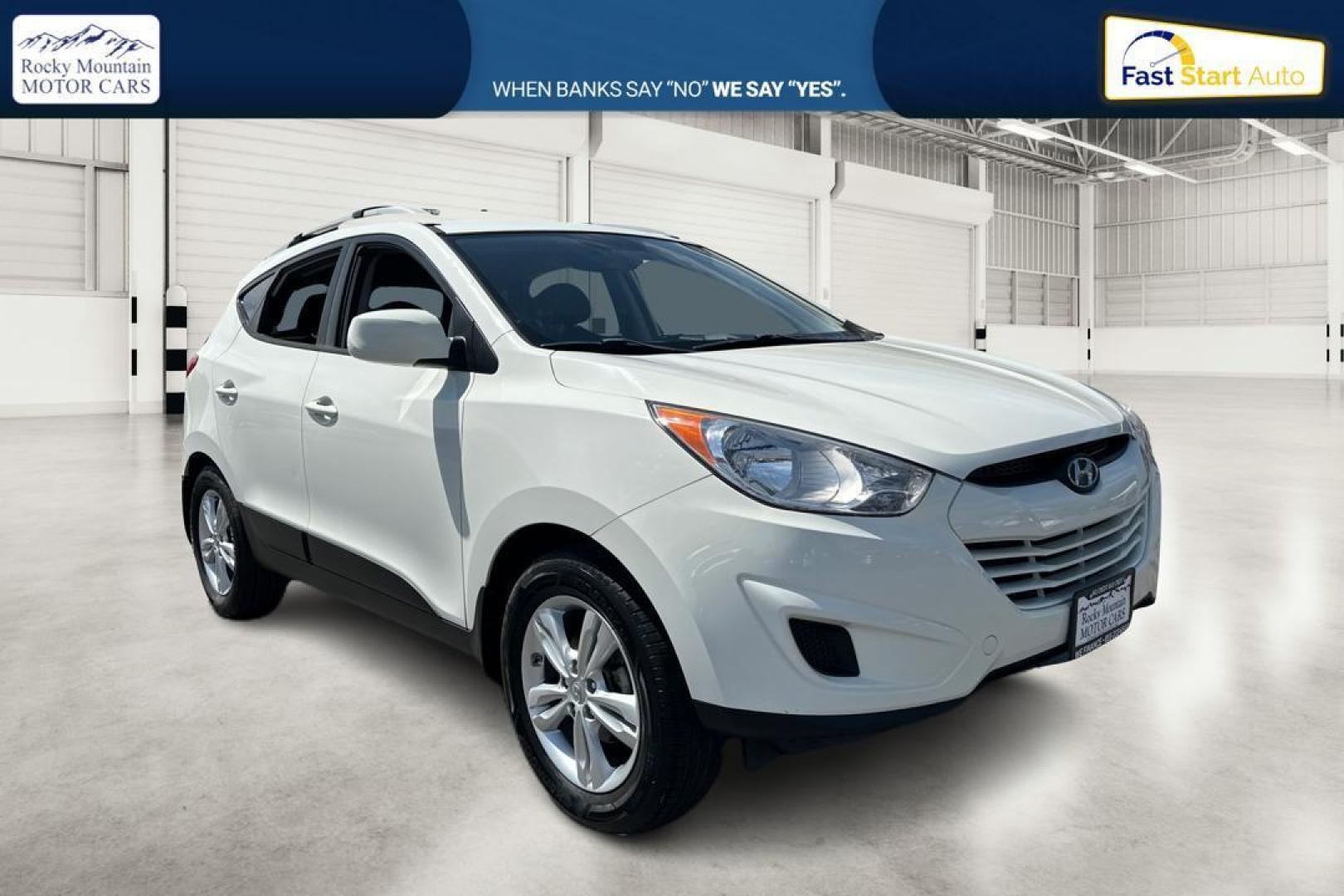 2011 White Hyundai Tucson Limited 2WD (KM8JU3AC5BU) with an 2.4L L4 DOHC 16V engine, 6-Speed Automatic transmission, located at 767 S State Road, Pleasant Grove, UT, 84062, (801) 785-1058, 40.354839, -111.736687 - Photo#0