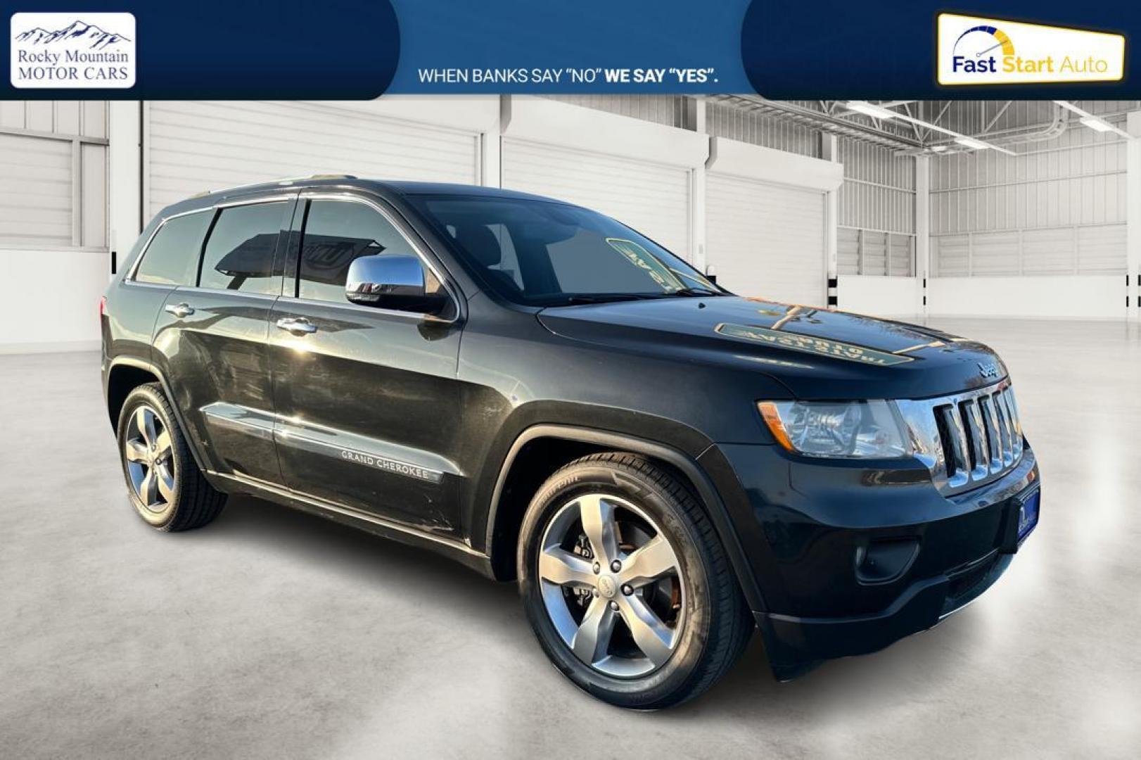 2012 Black Jeep Grand Cherokee Overland 4WD (1C4RJFCT2CC) with an 5.7L V8 OHV 16V engine, 5-Speed Automatic transmission, located at 7755 State Street, Midvale, UT, 84047, (801) 753-9063, 40.610329, -111.890656 - Photo#0