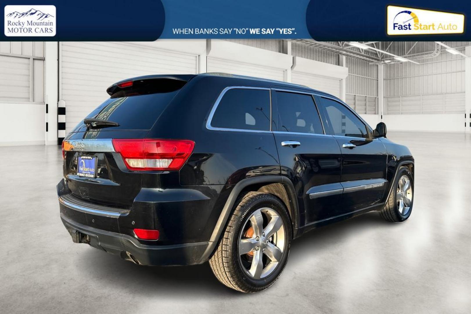 2012 Black Jeep Grand Cherokee Overland 4WD (1C4RJFCT2CC) with an 5.7L V8 OHV 16V engine, 5-Speed Automatic transmission, located at 7755 State Street, Midvale, UT, 84047, (801) 753-9063, 40.610329, -111.890656 - Photo#2