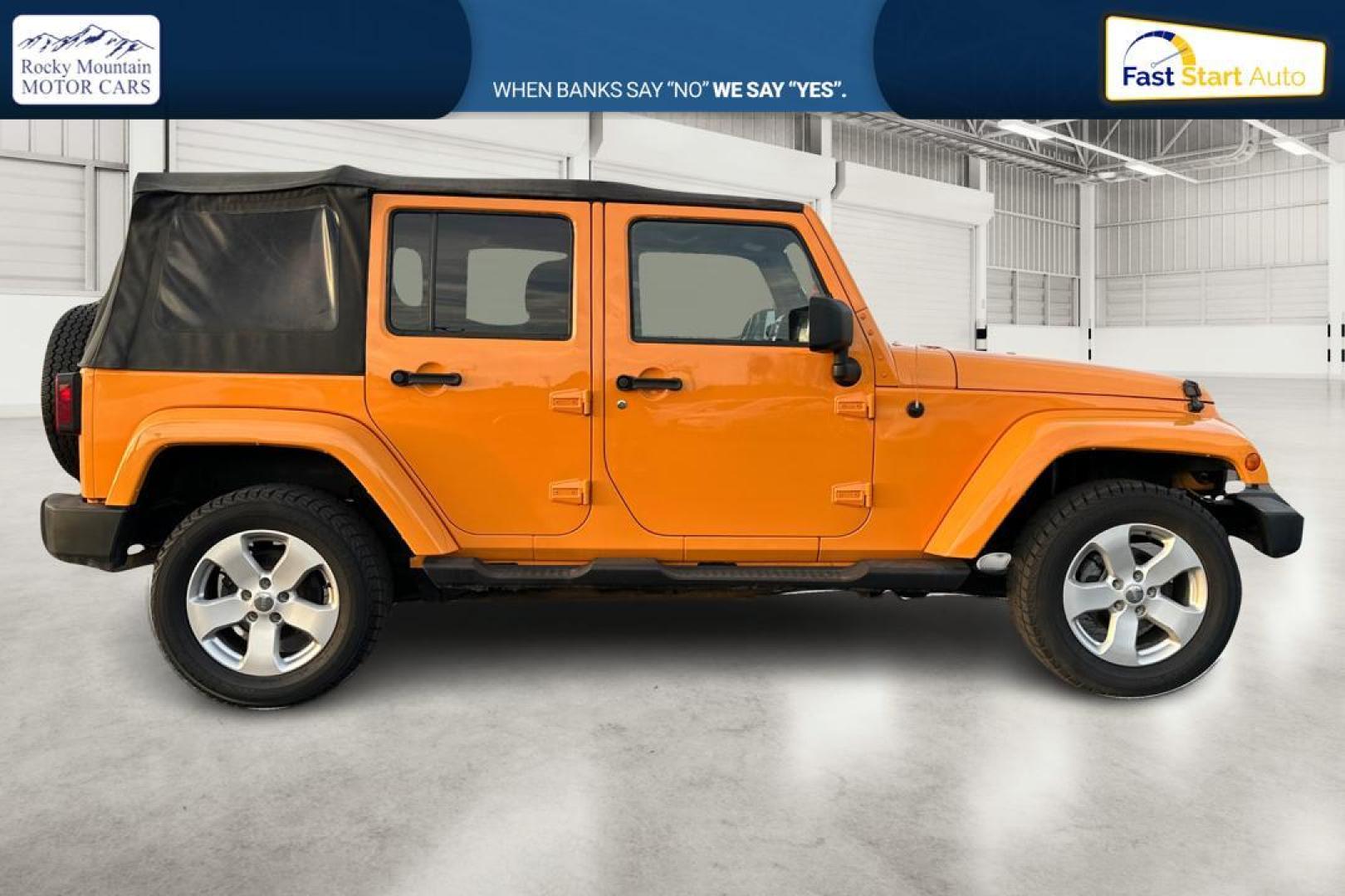 2012 Yellow Jeep Wrangler Unlimited Sahara 4WD (1C4BJWEG3CL) with an 3.6L V6 DOHC 24V FFV engine, Automatic, 5-Spd transmission, located at 7755 State Street, Midvale, UT, 84047, (801) 753-9063, 40.610329, -111.890656 - Photo#1