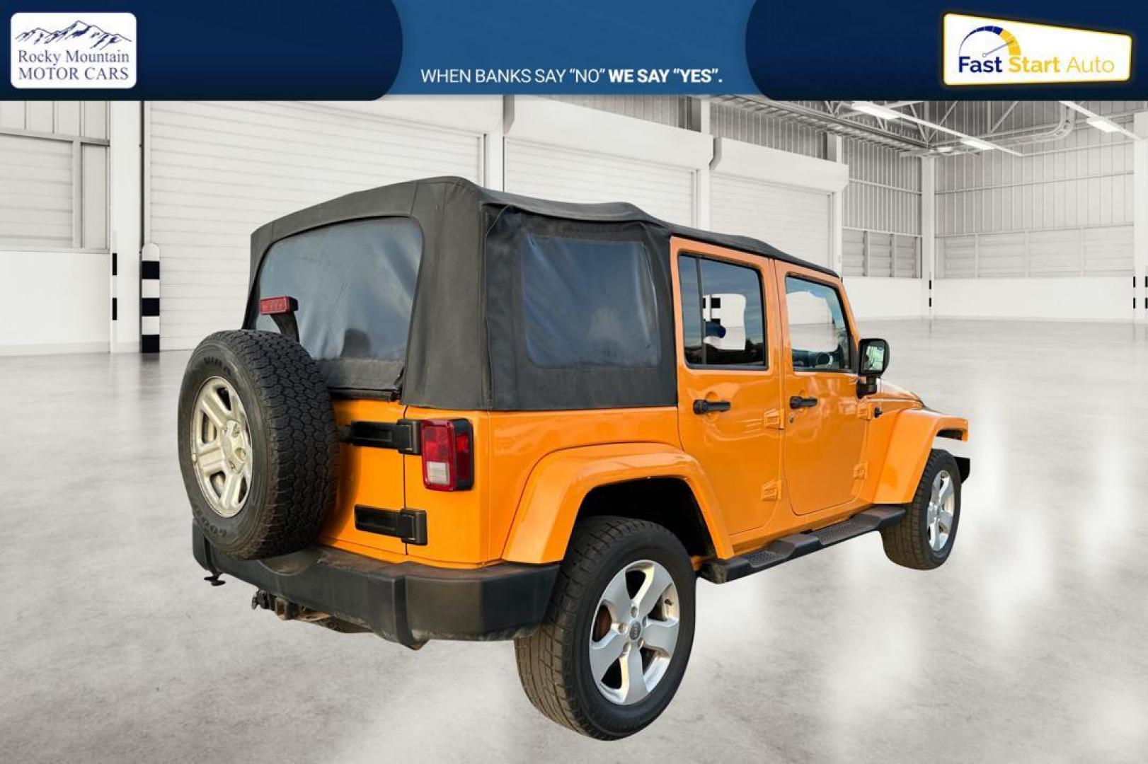 2012 Yellow Jeep Wrangler Unlimited Sahara 4WD (1C4BJWEG3CL) with an 3.6L V6 DOHC 24V FFV engine, Automatic, 5-Spd transmission, located at 7755 State Street, Midvale, UT, 84047, (801) 753-9063, 40.610329, -111.890656 - Photo#2