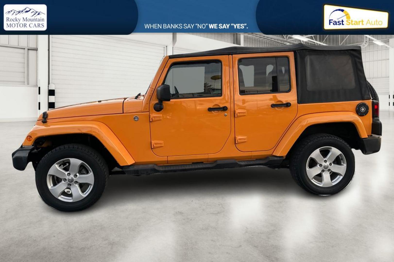 2012 Yellow Jeep Wrangler Unlimited Sahara 4WD (1C4BJWEG3CL) with an 3.6L V6 DOHC 24V FFV engine, Automatic, 5-Spd transmission, located at 7755 State Street, Midvale, UT, 84047, (801) 753-9063, 40.610329, -111.890656 - Photo#6