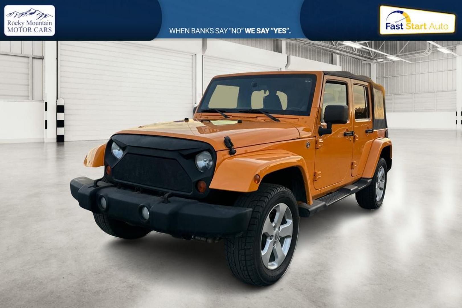 2012 Yellow Jeep Wrangler Unlimited Sahara 4WD (1C4BJWEG3CL) with an 3.6L V6 DOHC 24V FFV engine, Automatic, 5-Spd transmission, located at 7755 State Street, Midvale, UT, 84047, (801) 753-9063, 40.610329, -111.890656 - Photo#8