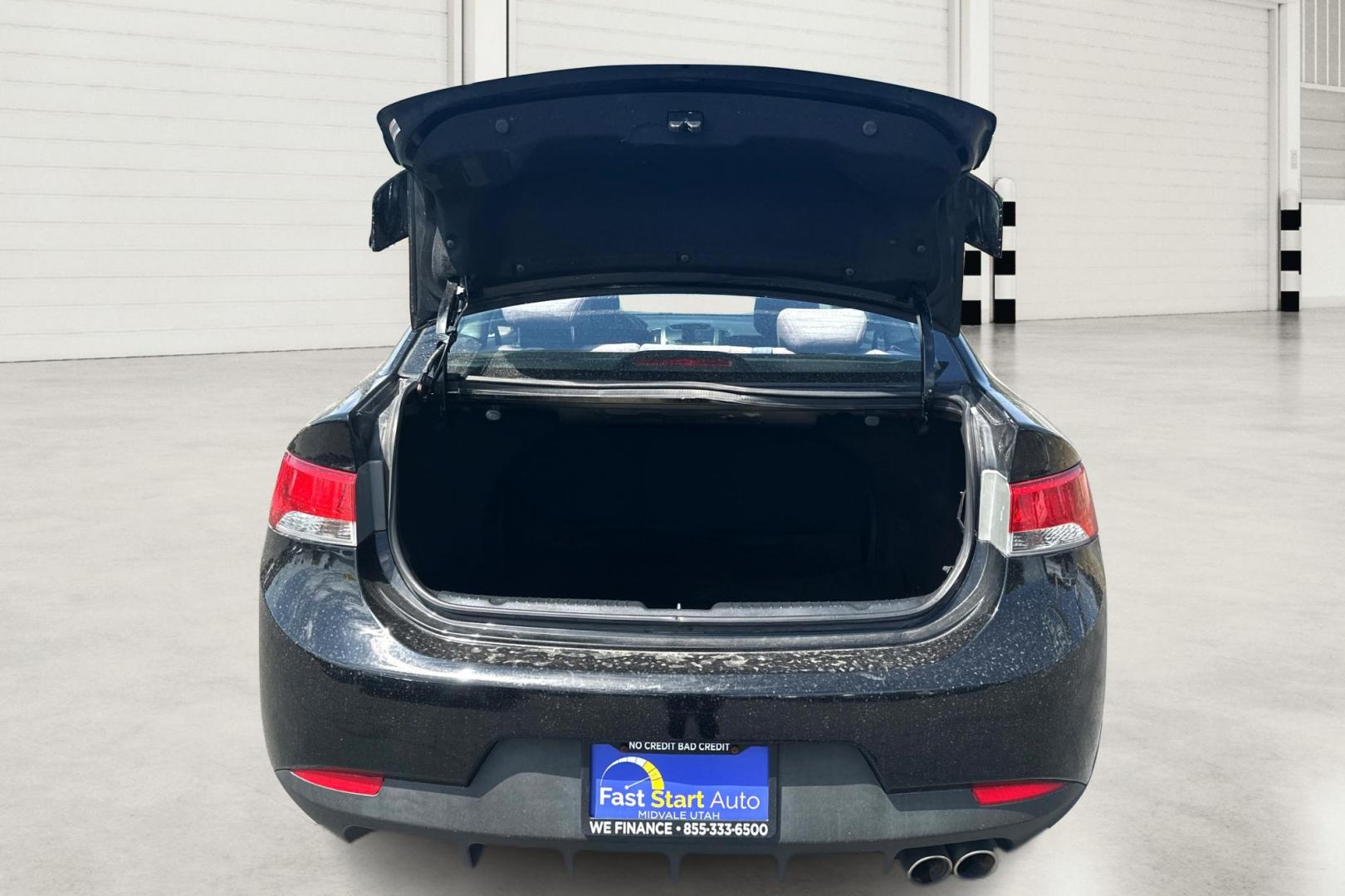 2012 Black Kia Forte Koup SX (KNAFW6A34C5) with an 2.4L L4 DOHC 16V engine, Automatic, 6-Spd w/Overdrive and Sportmatic transmission, located at 7755 State Street, Midvale, UT, 84047, (801) 753-9063, 40.610329, -111.890656 - Photo#10