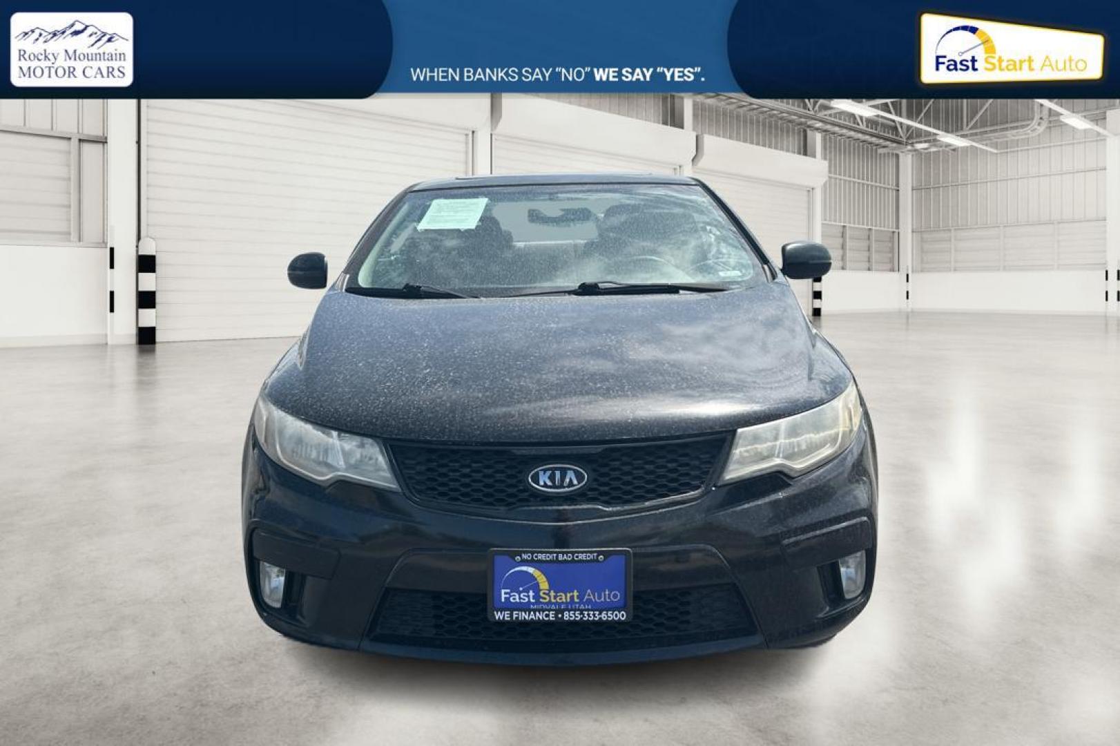 2012 Black Kia Forte Koup SX (KNAFW6A34C5) with an 2.4L L4 DOHC 16V engine, Automatic, 6-Spd w/Overdrive and Sportmatic transmission, located at 7755 State Street, Midvale, UT, 84047, (801) 753-9063, 40.610329, -111.890656 - Photo#7