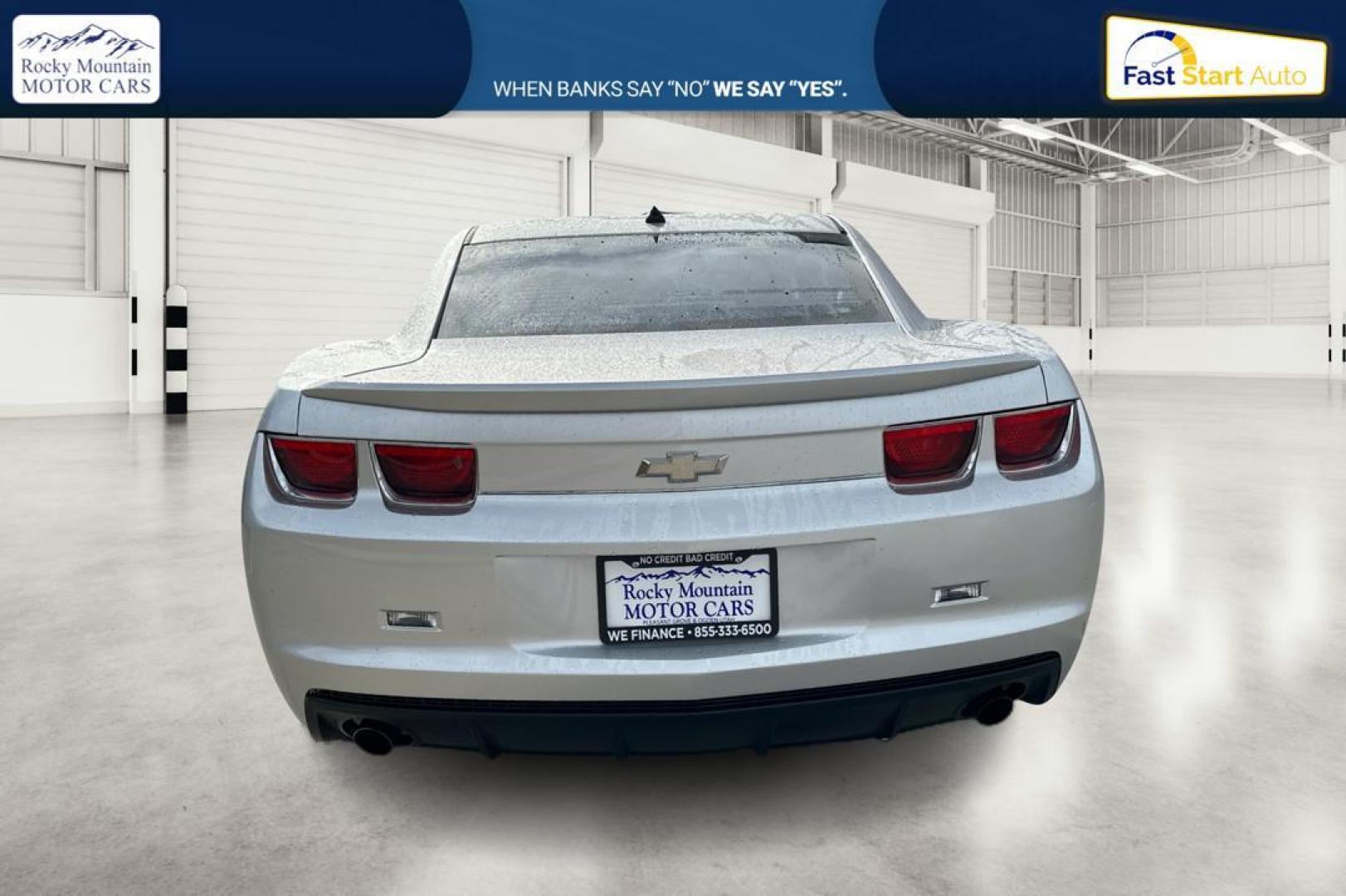 2013 Silver Chevrolet Camaro LS Coupe (2G1FE1E33D9) with an 3.6L V6 DOHC 24V FFV engine, 6-Speed Manual transmission, located at 344 S Washington Blvd, Ogden, UT, 84404, (801) 399-1799, 41.255482, -111.970848 - Photo#3