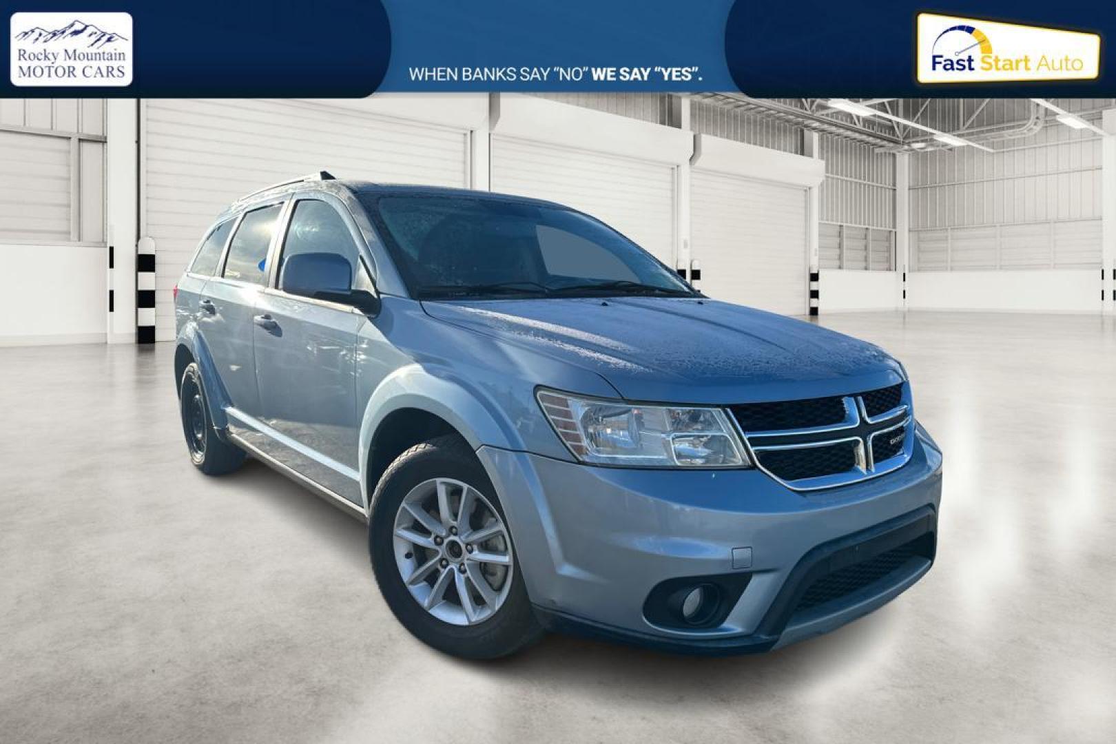 2013 Blue Dodge Journey SXT (3C4PDCBB8DT) with an 2.4L L6 DOHC 16V engine, 4-Speed Automatic transmission, located at 767 S State Road, Pleasant Grove, UT, 84062, (801) 785-1058, 40.354839, -111.736687 - Photo#0