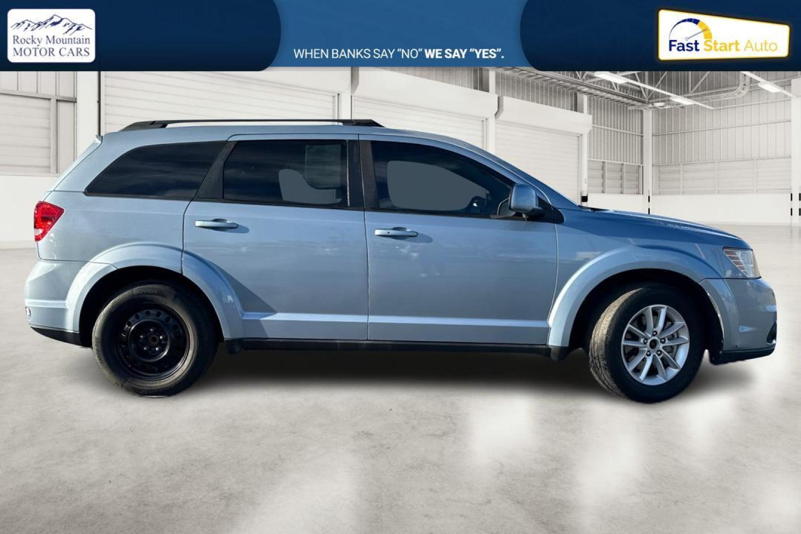 2013 Blue Dodge Journey SXT (3C4PDCBB8DT) with an 2.4L L6 DOHC 16V engine, 4-Speed Automatic transmission, located at 767 S State Road, Pleasant Grove, UT, 84062, (801) 785-1058, 40.354839, -111.736687 - Photo#1