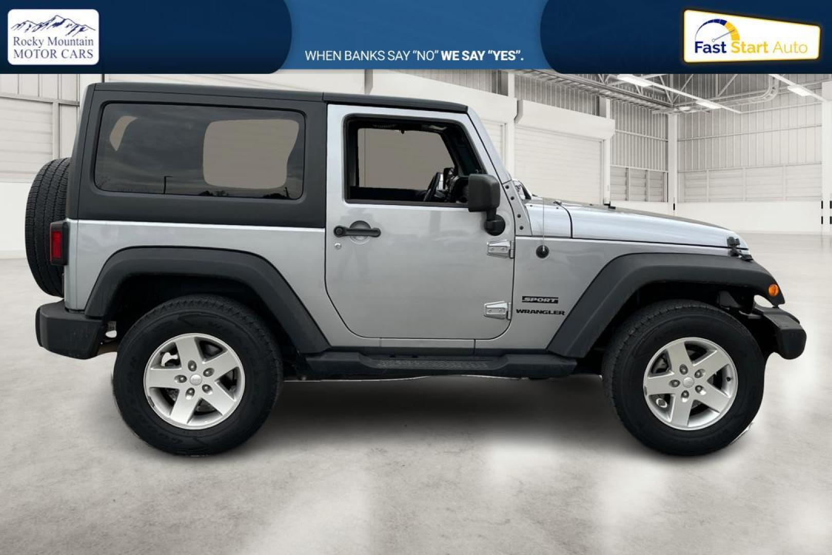 2013 Silver Jeep Wrangler Sport 4WD (1C4GJWAG0DL) with an 3.6L V6 DOHC 24V FFV engine, Automatic, 5-Spd transmission, located at 767 S State Road, Pleasant Grove, UT, 84062, (801) 785-1058, 40.354839, -111.736687 - Photo#1