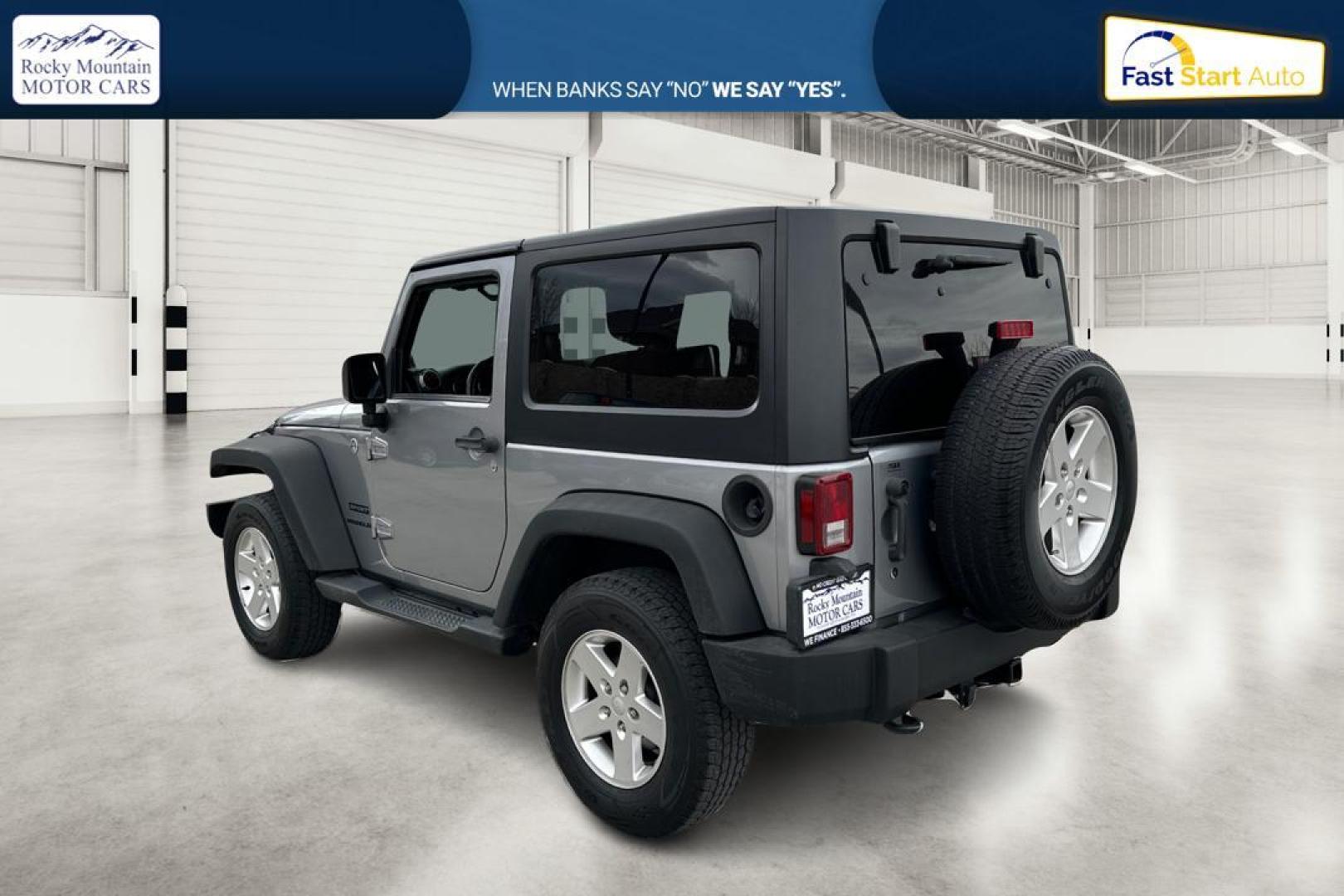 2013 Silver Jeep Wrangler Sport 4WD (1C4GJWAG0DL) with an 3.6L V6 DOHC 24V FFV engine, Automatic, 5-Spd transmission, located at 767 S State Road, Pleasant Grove, UT, 84062, (801) 785-1058, 40.354839, -111.736687 - Photo#5