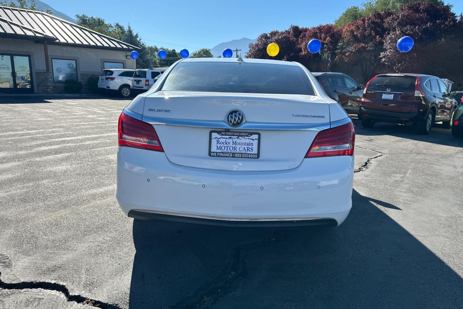 2014 White Buick LaCrosse Leather Package (1G4GB5GR0EF) with an 2.4L L4 DOHC 16V engine, 6-Speed Automatic transmission, located at 767 S State Road, Pleasant Grove, UT, 84062, (801) 785-1058, 40.354839, -111.736687 - Photo#3