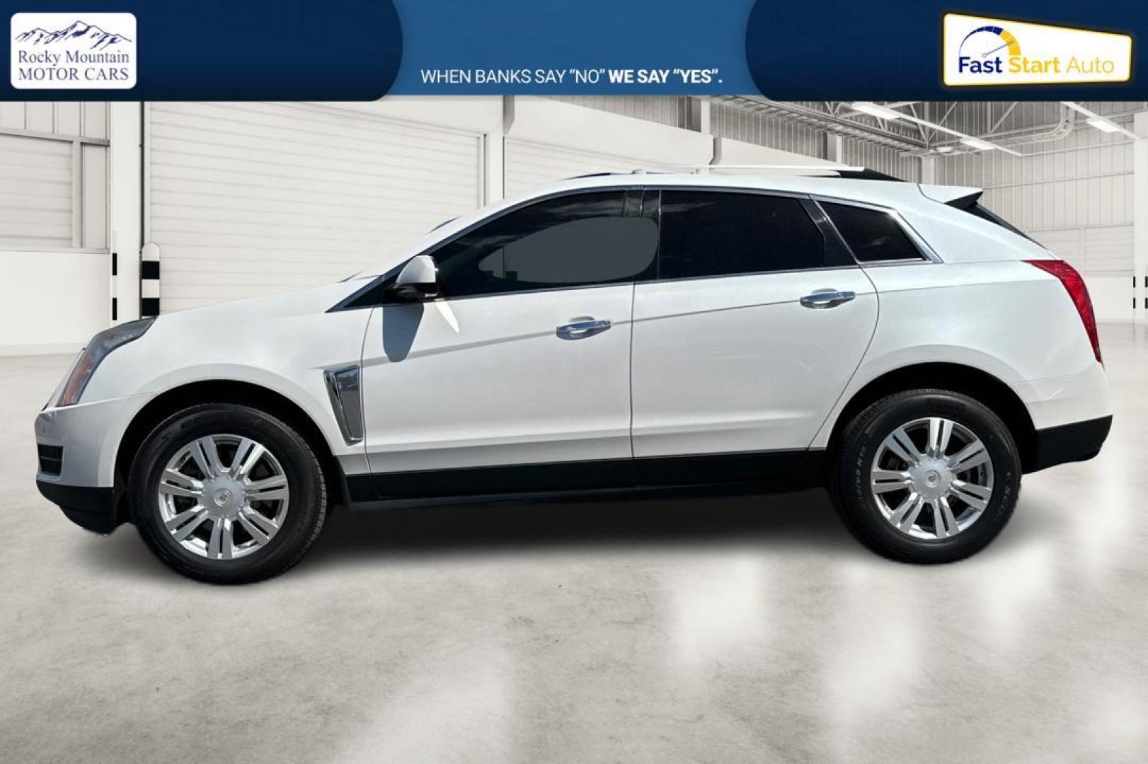 2014 White Cadillac SRX Luxury Collection FWD (3GYFNBE31ES) with an 3.6L V6 DOHC 24V FFV engine, 6-Speed Automatic transmission, located at 344 S Washington Blvd, Ogden, UT, 84404, (801) 399-1799, 41.255482, -111.970848 - Photo#5