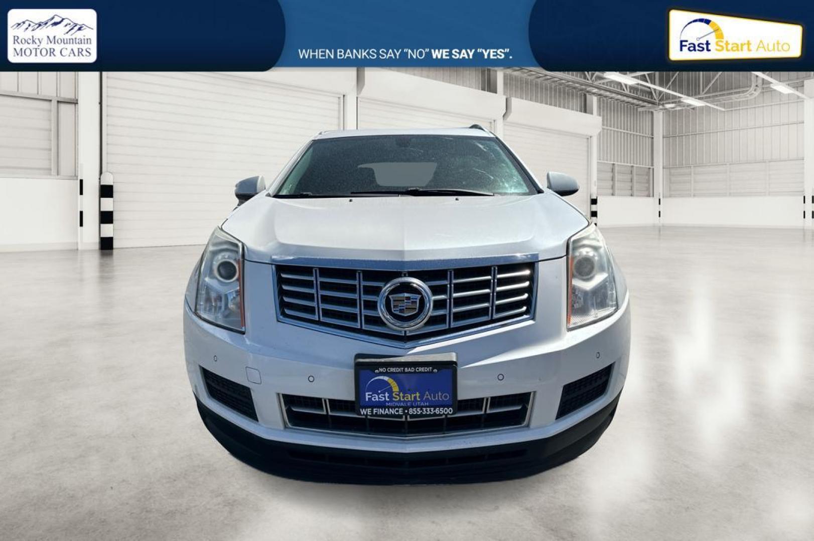 2014 White Cadillac SRX Luxury Collection FWD (3GYFNBE31ES) with an 3.6L V6 DOHC 24V FFV engine, 6-Speed Automatic transmission, located at 344 S Washington Blvd, Ogden, UT, 84404, (801) 399-1799, 41.255482, -111.970848 - Photo#7