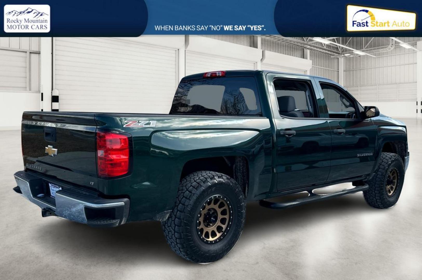 2014 Green Chevrolet Silverado 1500 1LT Crew Cab 4WD (3GCUKREC0EG) with an 5.3L V8 OHV 16V engine, 6-Speed Automatic transmission, located at 767 S State Road, Pleasant Grove, UT, 84062, (801) 785-1058, 40.354839, -111.736687 - Photo#2