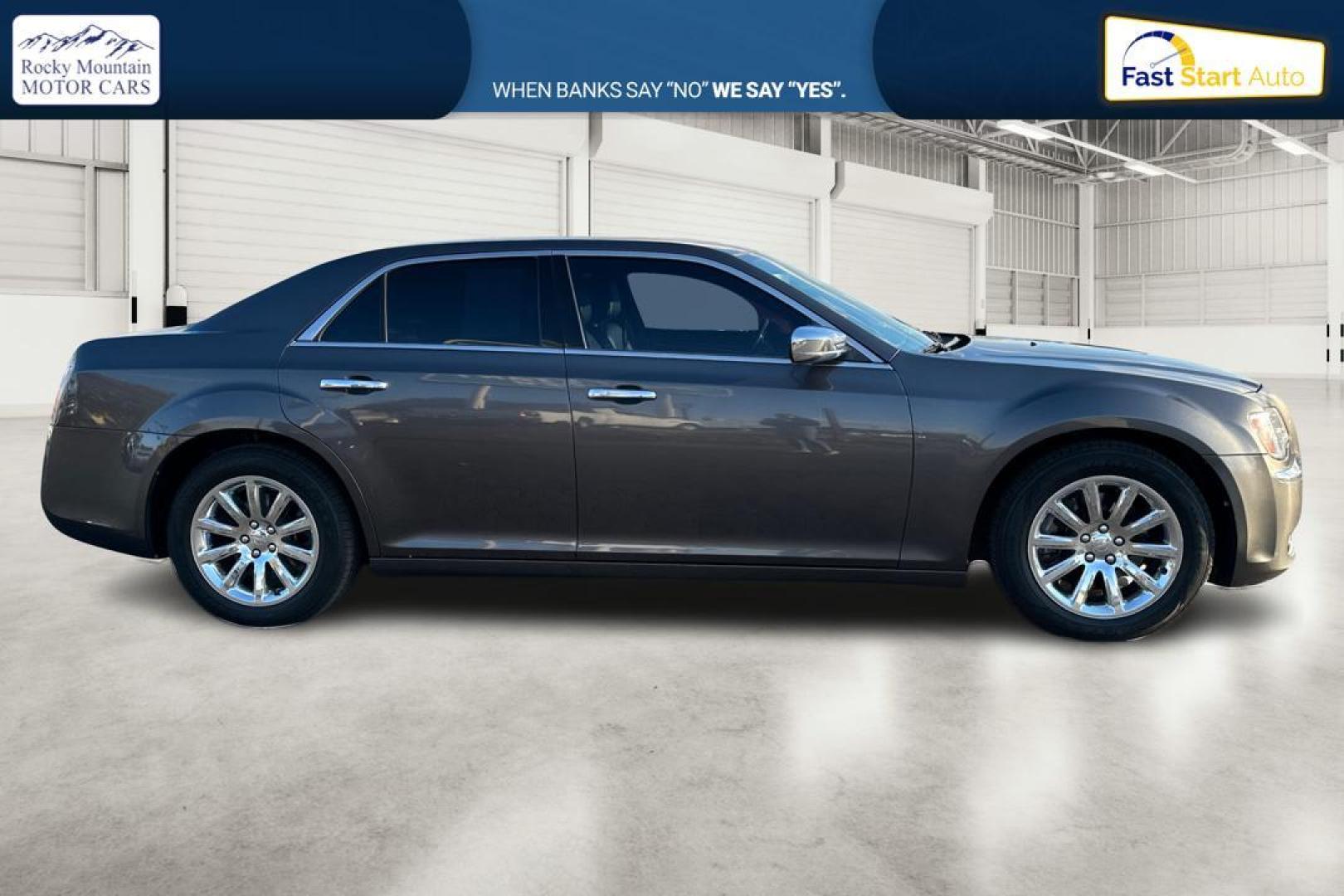 2014 Gray Chrysler 300 C RWD (2C3CCAET3EH) with an 5.7L V8 OHV 16V engine, 5-Speed Automatic transmission, located at 7755 State Street, Midvale, UT, 84047, (801) 753-9063, 40.610329, -111.890656 - Photo#1