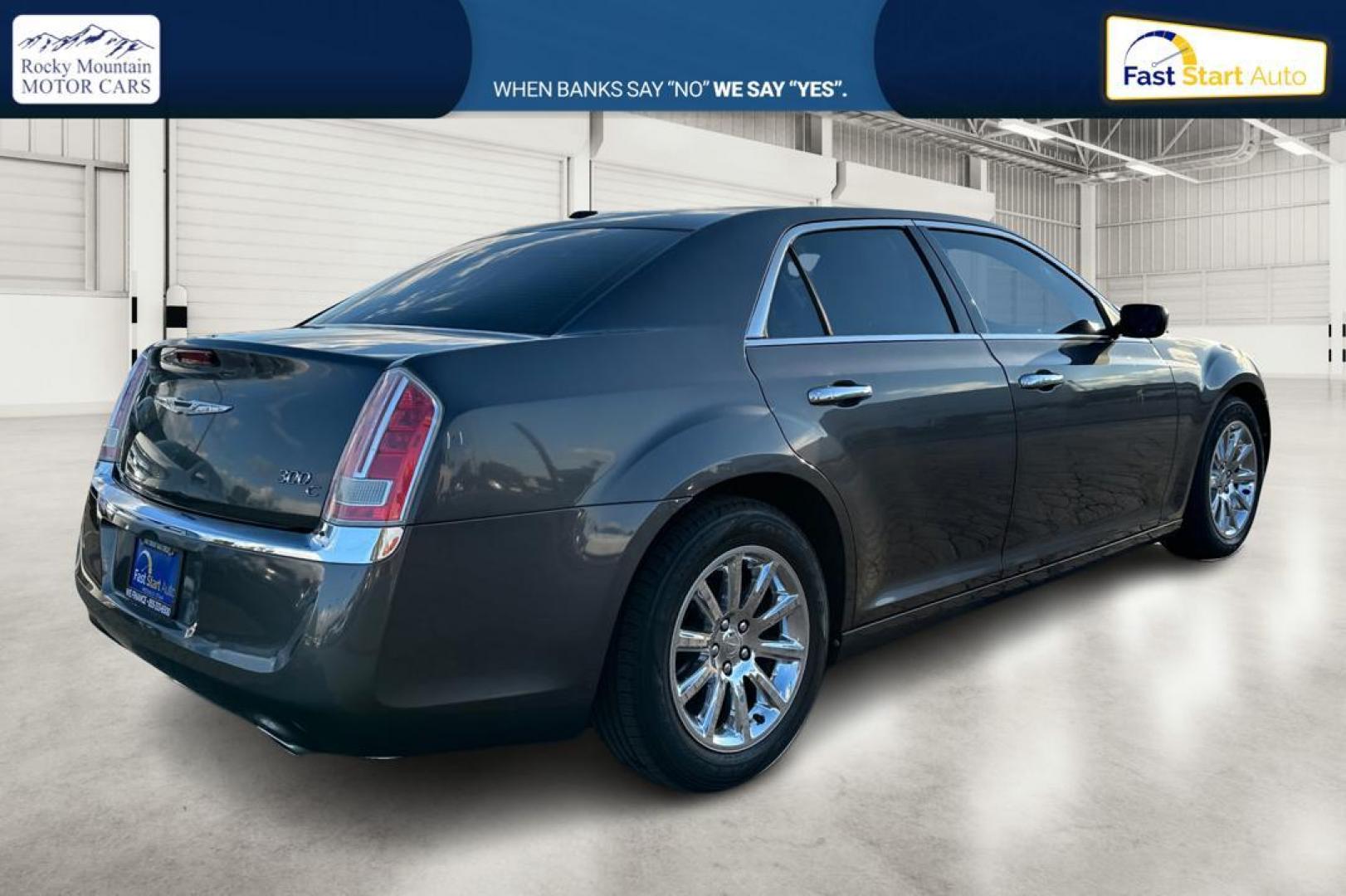 2014 Gray Chrysler 300 C RWD (2C3CCAET3EH) with an 5.7L V8 OHV 16V engine, 5-Speed Automatic transmission, located at 7755 State Street, Midvale, UT, 84047, (801) 753-9063, 40.610329, -111.890656 - Photo#2