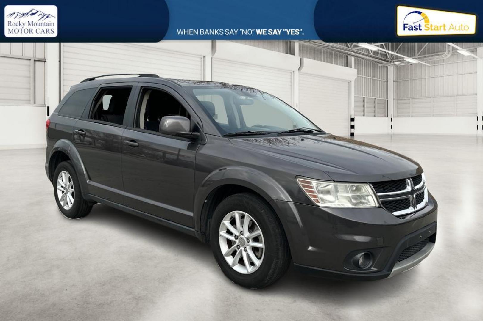 2014 Gray Dodge Journey SXT (3C4PDCBB6ET) with an 2.4L L6 DOHC 16V engine, 4-Speed Automatic transmission, located at 344 S Washington Blvd, Ogden, UT, 84404, (801) 399-1799, 41.255482, -111.970848 - Photo#0