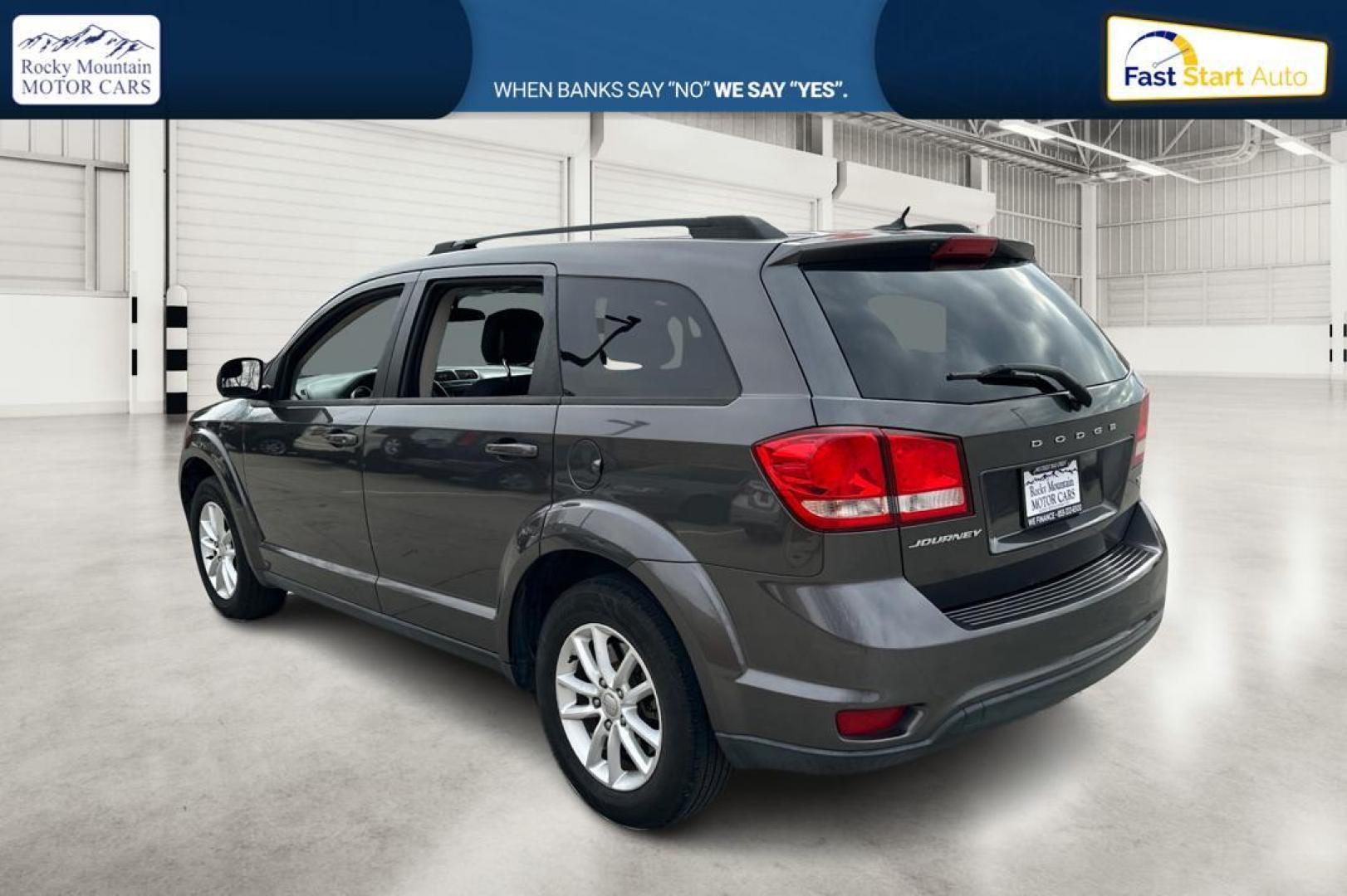 2014 Gray Dodge Journey SXT (3C4PDCBB6ET) with an 2.4L L6 DOHC 16V engine, 4-Speed Automatic transmission, located at 344 S Washington Blvd, Ogden, UT, 84404, (801) 399-1799, 41.255482, -111.970848 - Photo#5