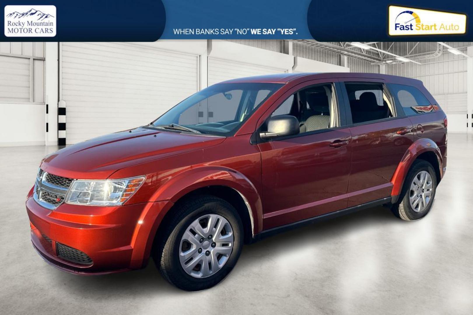 2014 Orange Dodge Journey SE (3C4PDCAB7ET) with an 2.4L L4 DOHC 16V engine, 4-Speed Automatic transmission, located at 344 S Washington Blvd, Ogden, UT, 84404, (801) 399-1799, 41.255482, -111.970848 - Photo#6