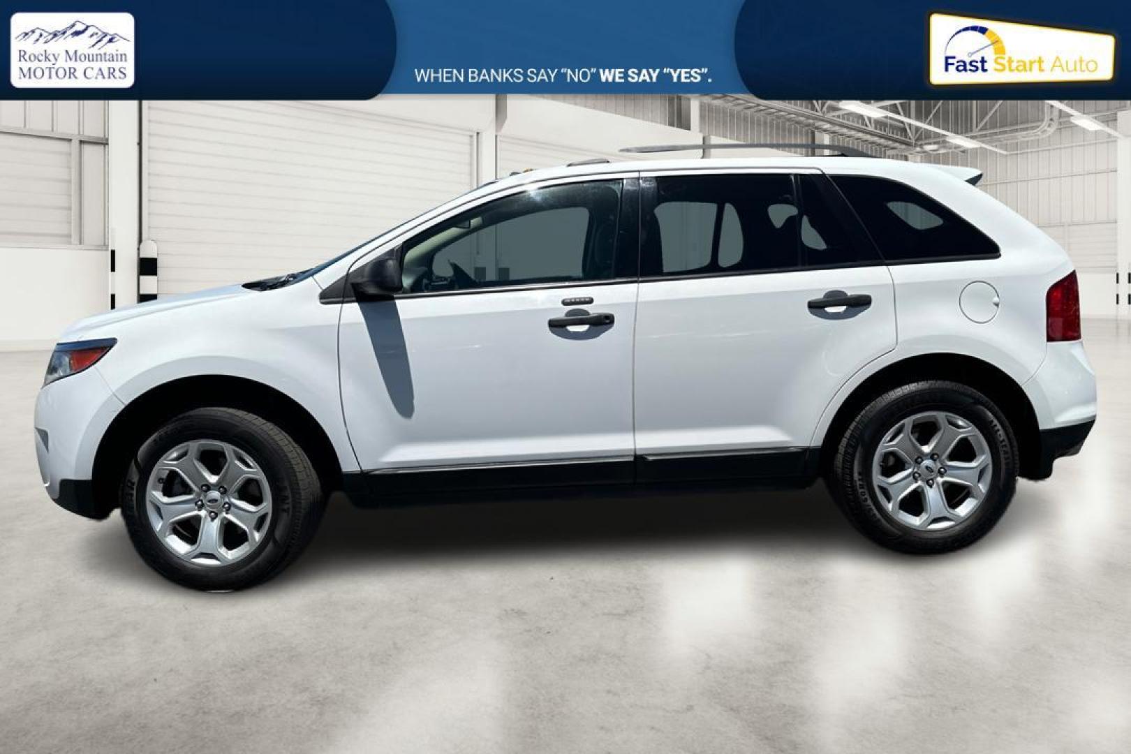 2014 White Ford Edge SE AWD (2FMDK4GCXEB) with an 3.5L V6 DOHC 24V engine, 6-Speed Automatic transmission, located at 344 S Washington Blvd, Ogden, UT, 84404, (801) 399-1799, 41.255482, -111.970848 - Photo#5