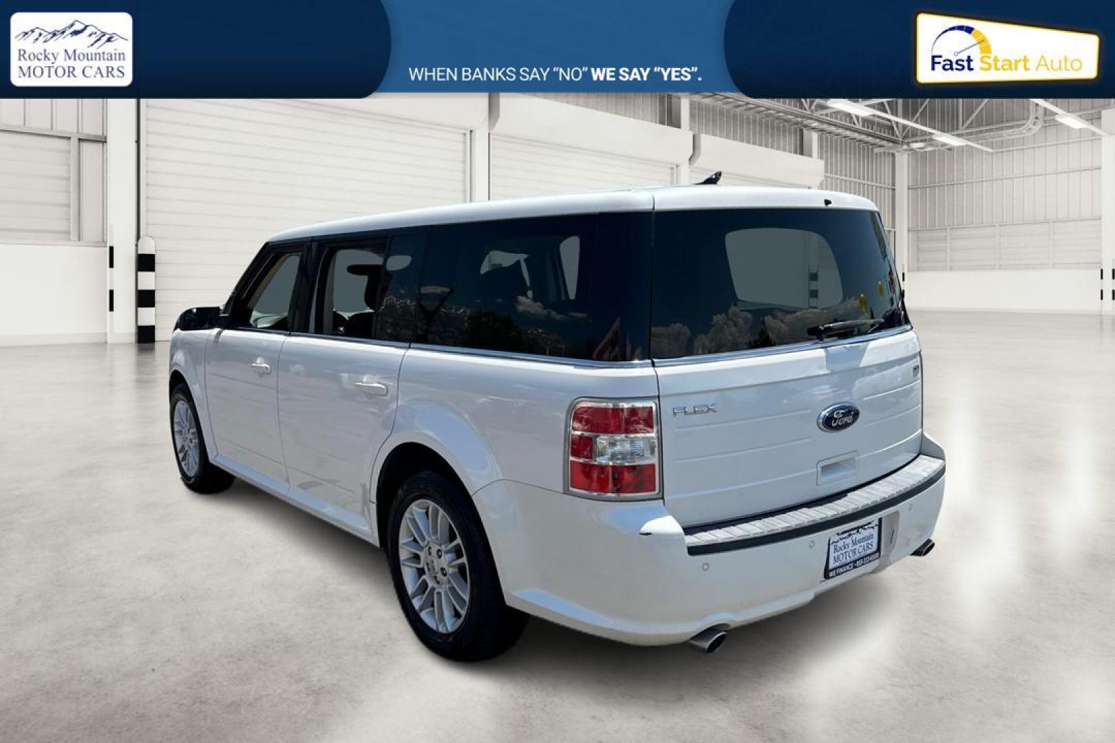 2014 White Ford Flex SEL FWD (2FMGK5C82EB) with an 3.5L V6 DOHC 24V engine, 6-Speed Automatic Overdrive transmission, located at 7755 State Street, Midvale, UT, 84047, (801) 753-9063, 40.610329, -111.890656 - Photo#4