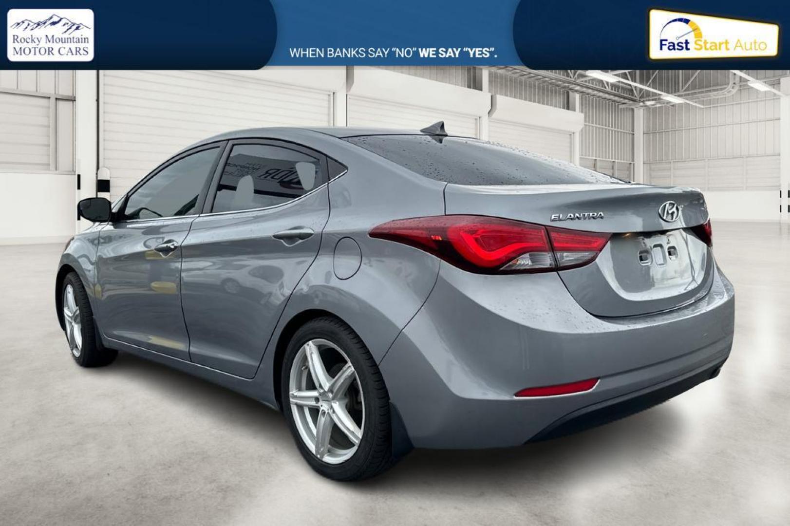 2014 Gray Hyundai Elantra GLS A/T (KMHDH4AH5EU) with an 2.0L L4 DOHC 16V engine, 6-Speed Automatic transmission, located at 344 S Washington Blvd, Ogden, UT, 84404, (801) 399-1799, 41.255482, -111.970848 - Photo#4