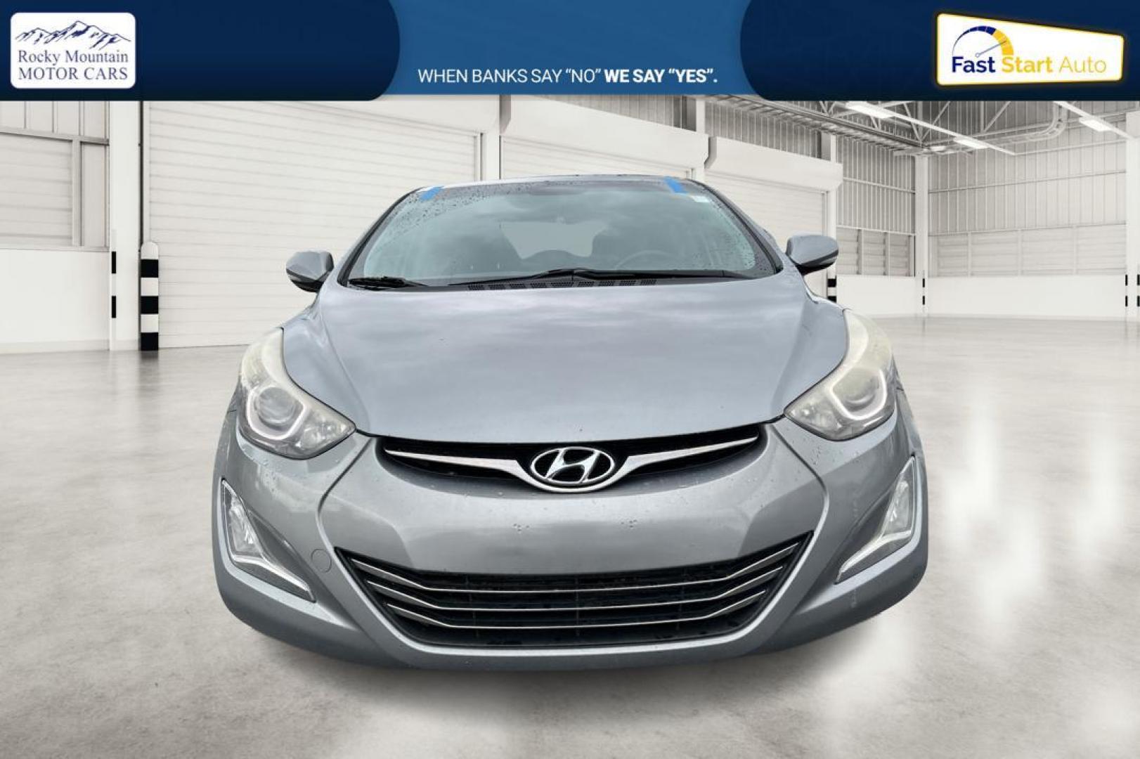 2014 Gray Hyundai Elantra GLS A/T (KMHDH4AH5EU) with an 2.0L L4 DOHC 16V engine, 6-Speed Automatic transmission, located at 344 S Washington Blvd, Ogden, UT, 84404, (801) 399-1799, 41.255482, -111.970848 - Photo#7