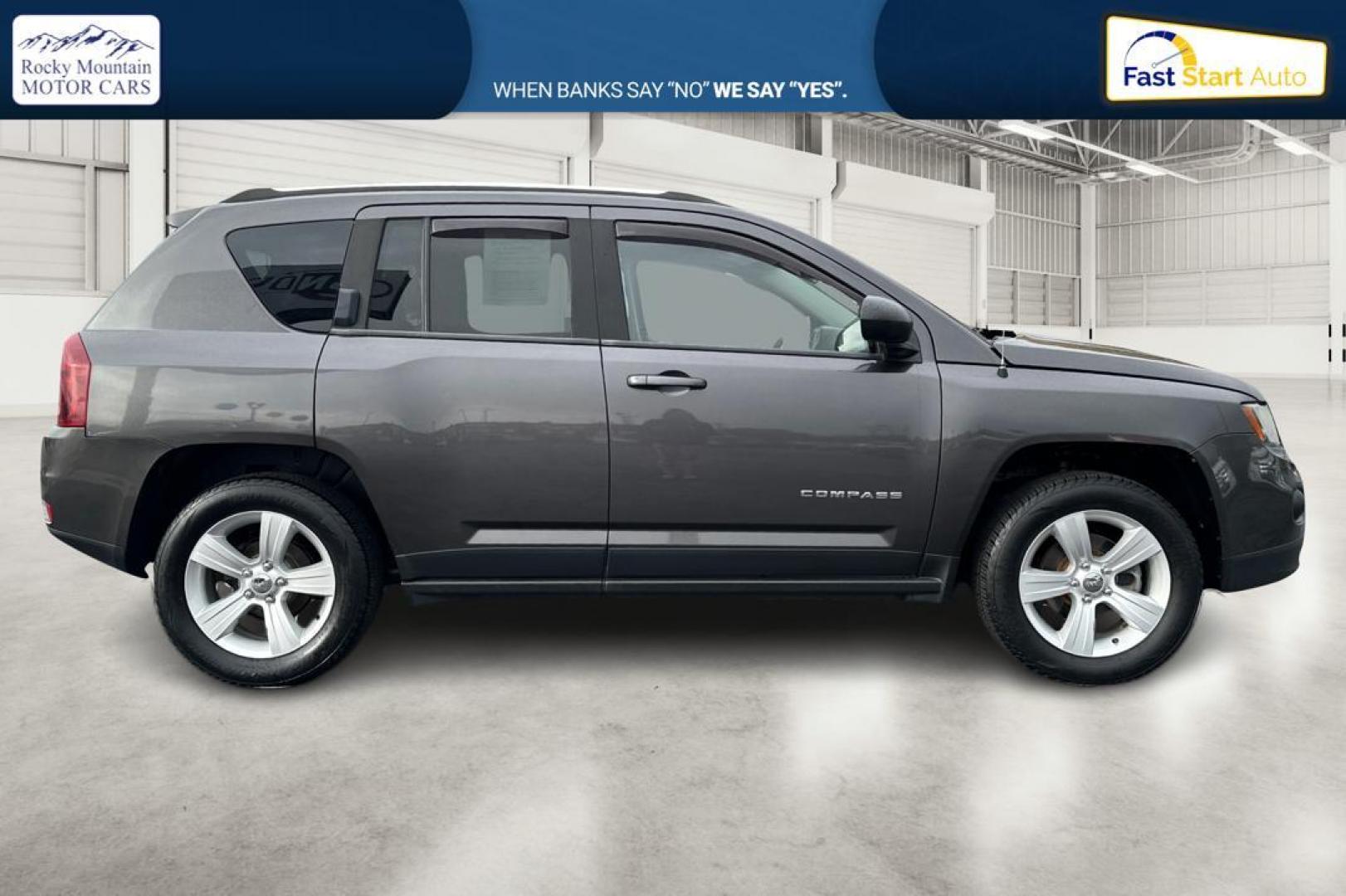 2014 Gray Jeep Compass Sport 4WD (1C4NJDBB3ED) with an 2.4L L4 DOHC 16V engine, Auto, 6-Spd AutoStick transmission, located at 7755 State Street, Midvale, UT, 84047, (801) 753-9063, 40.610329, -111.890656 - Photo#1