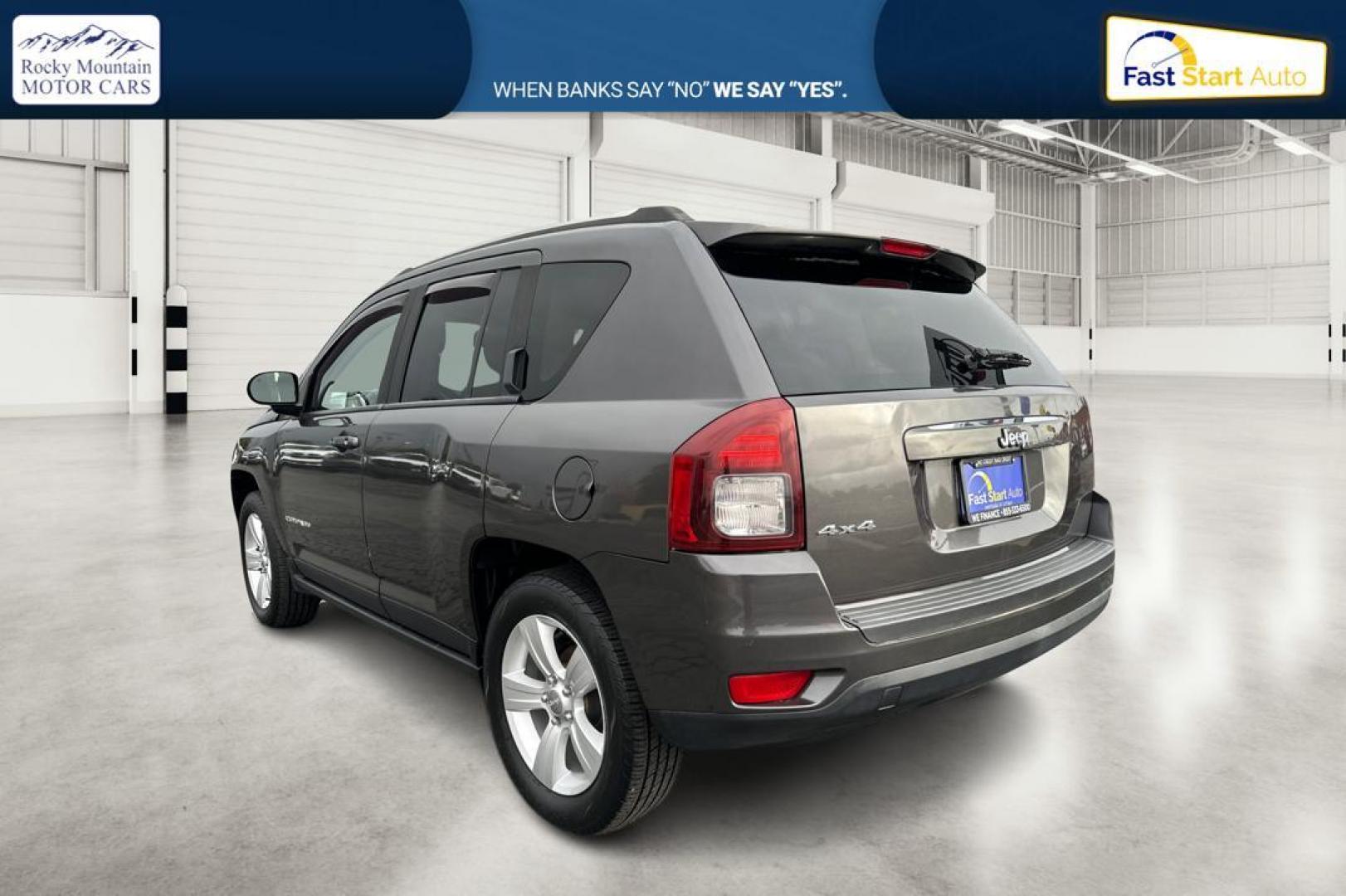 2014 Gray Jeep Compass Sport 4WD (1C4NJDBB3ED) with an 2.4L L4 DOHC 16V engine, Auto, 6-Spd AutoStick transmission, located at 7755 State Street, Midvale, UT, 84047, (801) 753-9063, 40.610329, -111.890656 - Photo#5