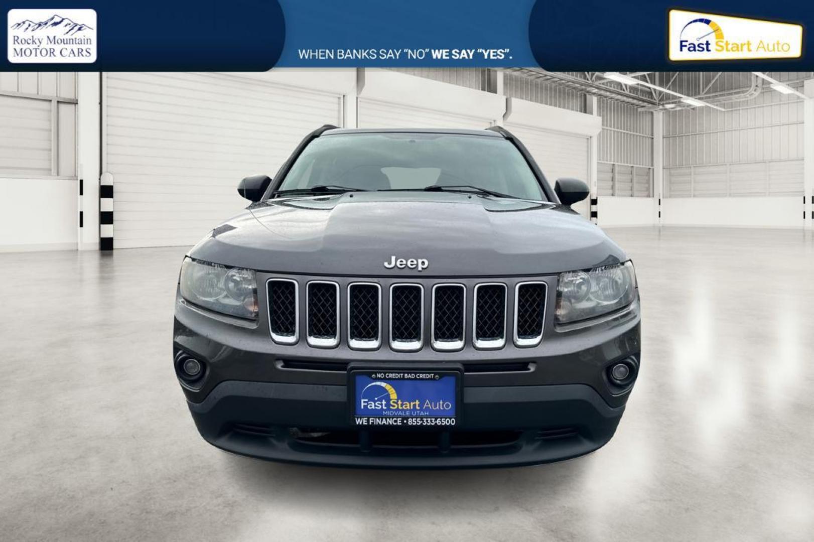 2014 Gray Jeep Compass Sport 4WD (1C4NJDBB3ED) with an 2.4L L4 DOHC 16V engine, Auto, 6-Spd AutoStick transmission, located at 7755 State Street, Midvale, UT, 84047, (801) 753-9063, 40.610329, -111.890656 - Photo#9