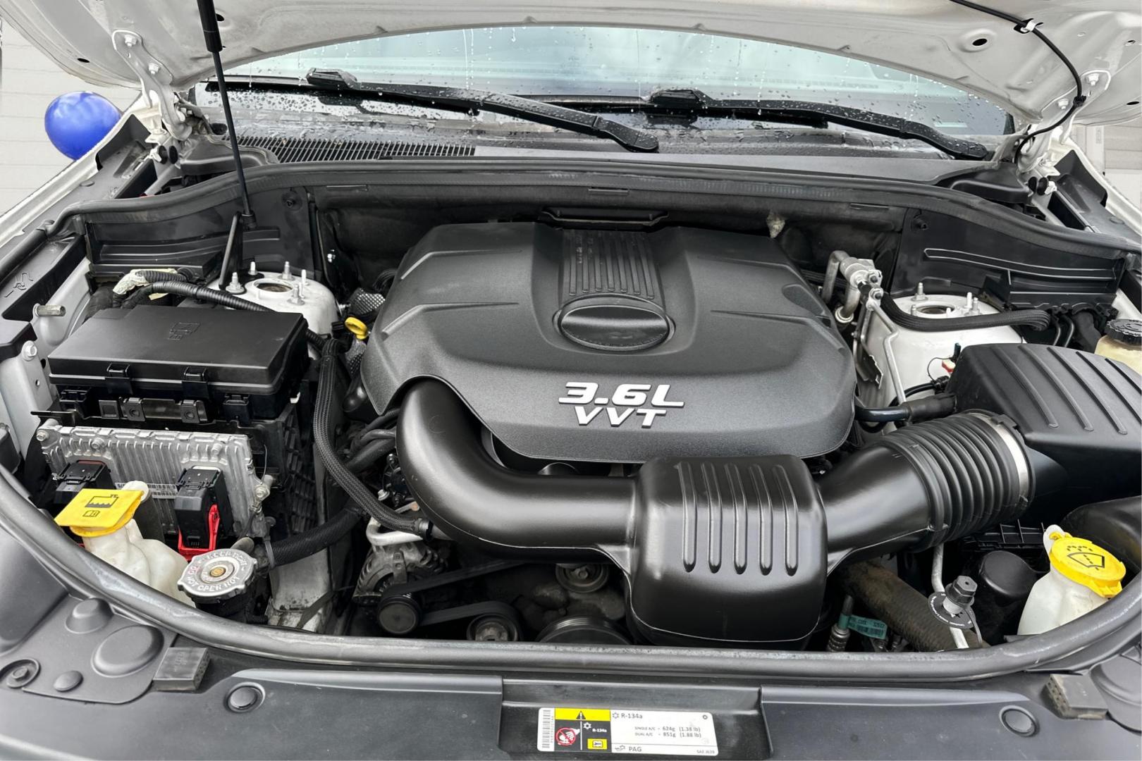 2014 White Jeep Grand Cherokee Laredo 4WD (1C4RJFAG2EC) with an 3.6L V6 DOHC 24V engine, 5-Speed Automatic transmission, located at 7755 State Street, Midvale, UT, 84047, (801) 753-9063, 40.610329, -111.890656 - Photo#10