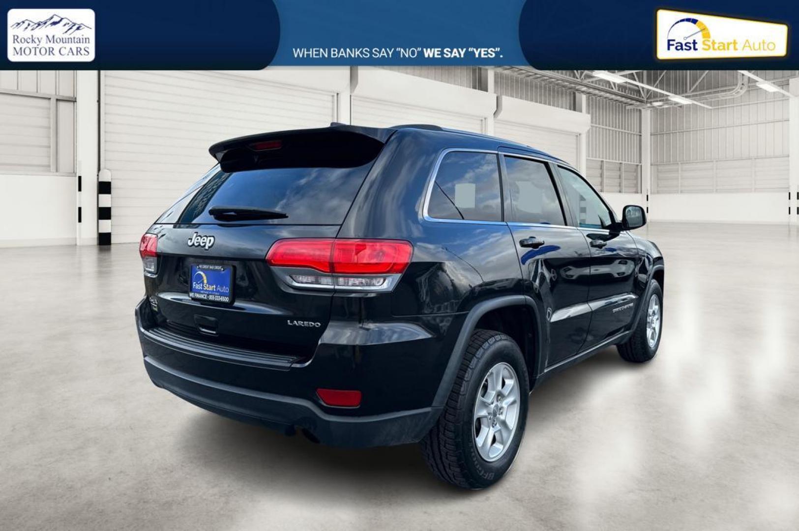 2014 Black Jeep Grand Cherokee Laredo 4WD (1C4RJFAG1EC) with an 3.6L V6 DOHC 24V engine, 5-Speed Automatic transmission, located at 7755 State Street, Midvale, UT, 84047, (801) 753-9063, 40.610329, -111.890656 - Photo#2