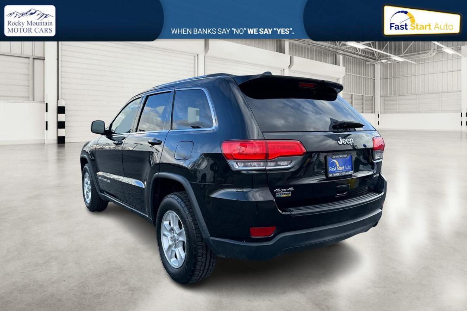 2014 Black Jeep Grand Cherokee Laredo 4WD (1C4RJFAG1EC) with an 3.6L V6 DOHC 24V engine, 5-Speed Automatic transmission, located at 7755 State Street, Midvale, UT, 84047, (801) 753-9063, 40.610329, -111.890656 - Photo#5