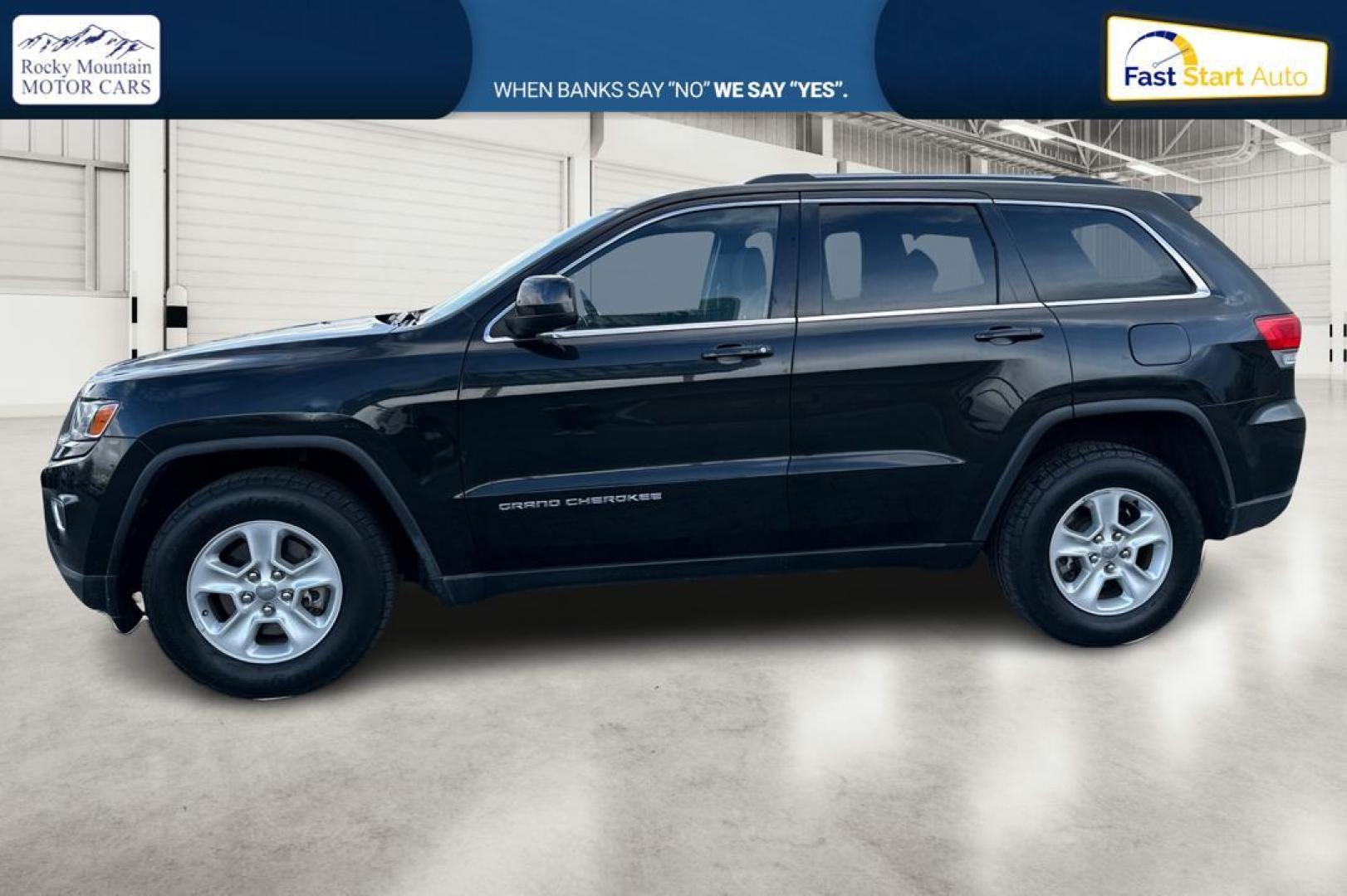 2014 Black Jeep Grand Cherokee Laredo 4WD (1C4RJFAG1EC) with an 3.6L V6 DOHC 24V engine, 5-Speed Automatic transmission, located at 7755 State Street, Midvale, UT, 84047, (801) 753-9063, 40.610329, -111.890656 - Photo#6