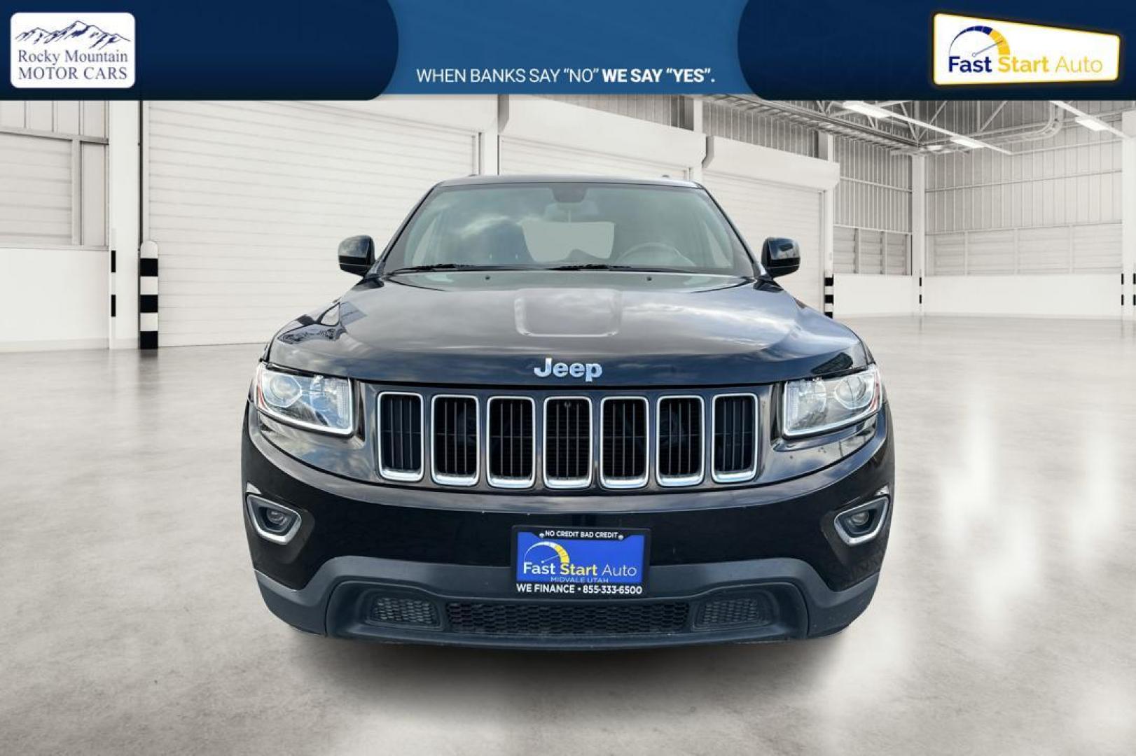 2014 Black Jeep Grand Cherokee Laredo 4WD (1C4RJFAG1EC) with an 3.6L V6 DOHC 24V engine, 5-Speed Automatic transmission, located at 7755 State Street, Midvale, UT, 84047, (801) 753-9063, 40.610329, -111.890656 - Photo#9