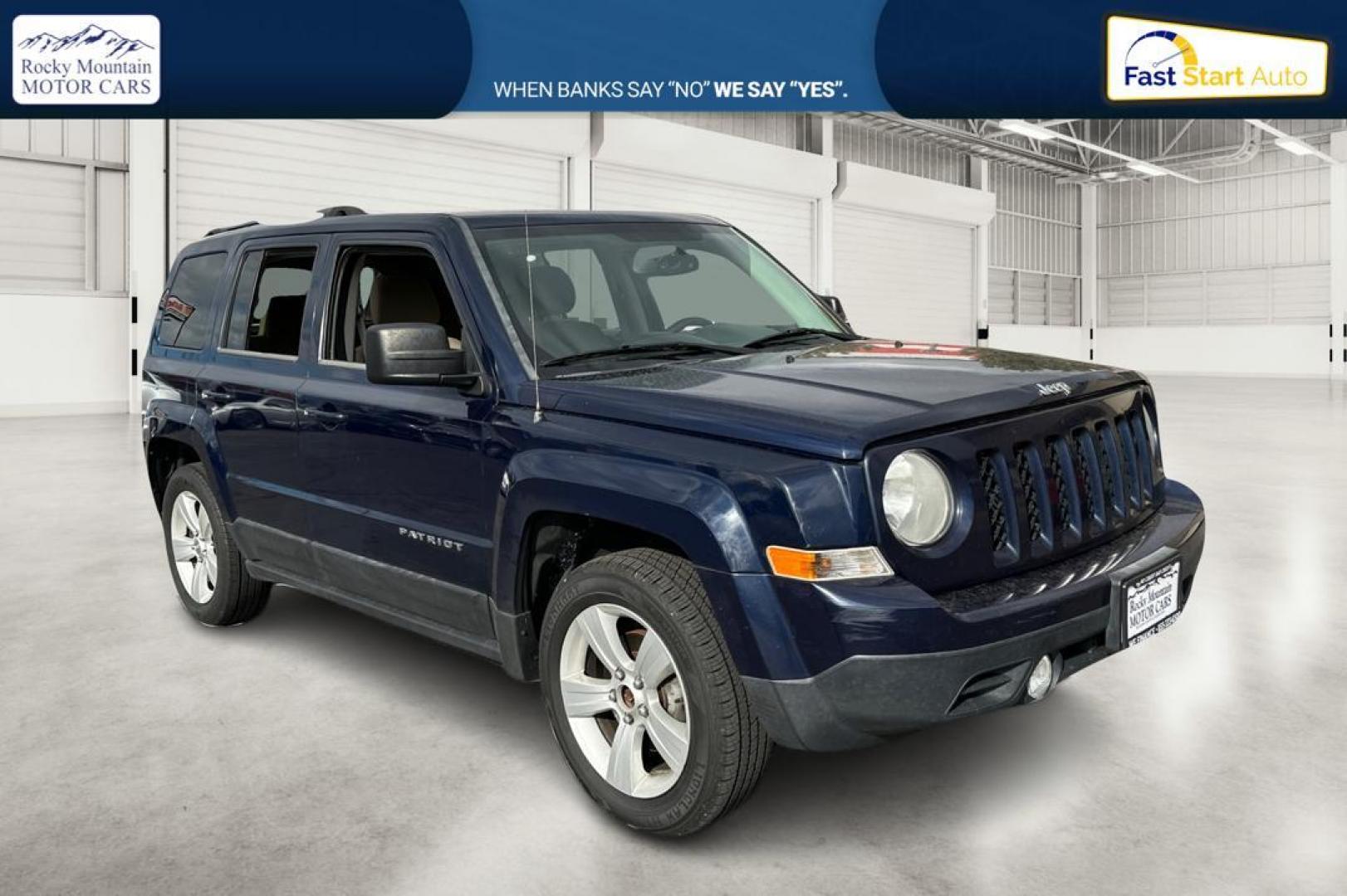 2014 Blue Jeep Patriot Latitude 2WD (1C4NJPFA5ED) with an 2.0L L4 DOHC 16V engine, Automatic, 6-Spd w/AutoStick transmission, located at 344 S Washington Blvd, Ogden, UT, 84404, (801) 399-1799, 41.255482, -111.970848 - Photo#0