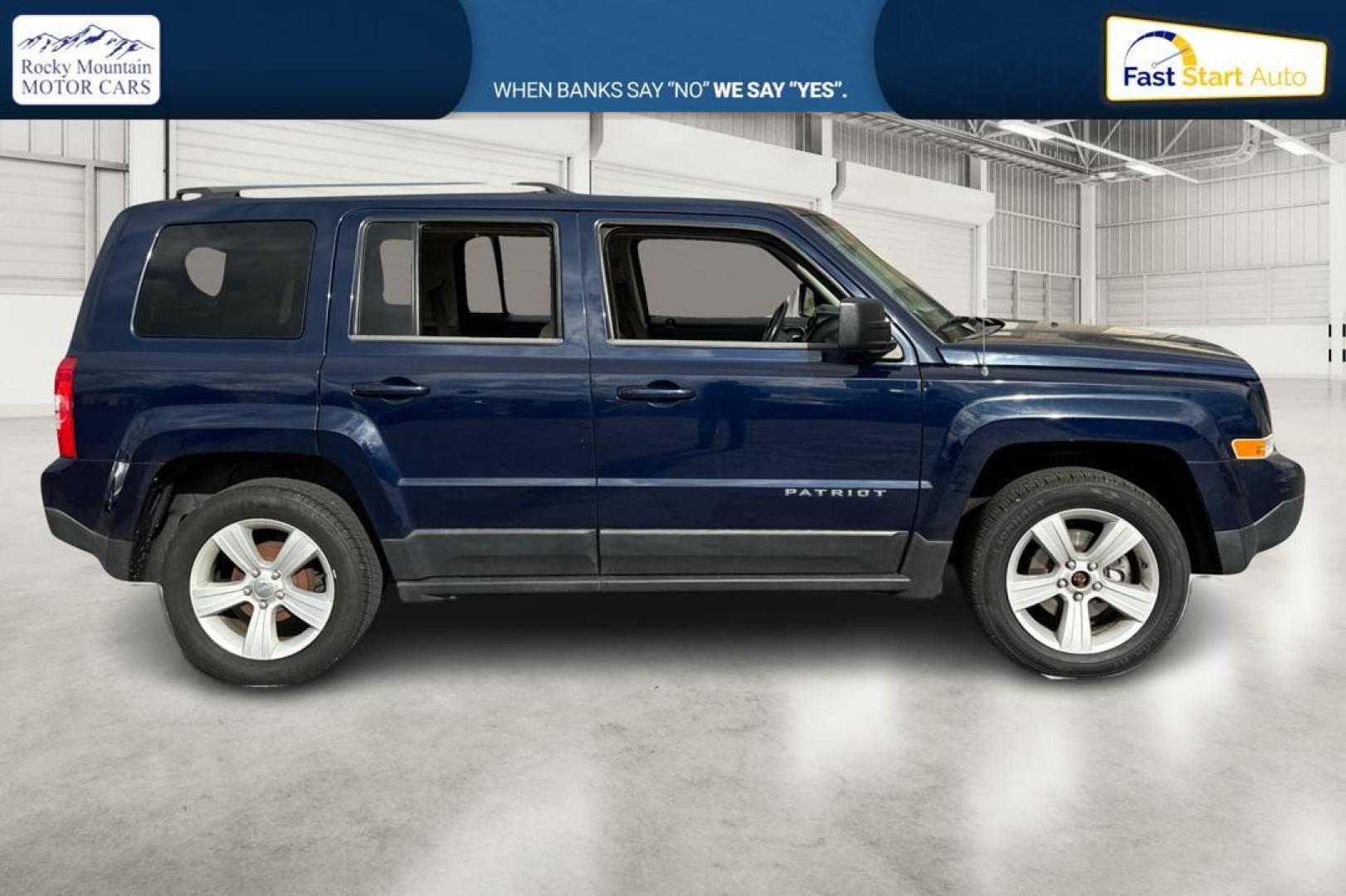 2014 Blue Jeep Patriot Latitude 2WD (1C4NJPFA5ED) with an 2.0L L4 DOHC 16V engine, Automatic, 6-Spd w/AutoStick transmission, located at 344 S Washington Blvd, Ogden, UT, 84404, (801) 399-1799, 41.255482, -111.970848 - Photo#1