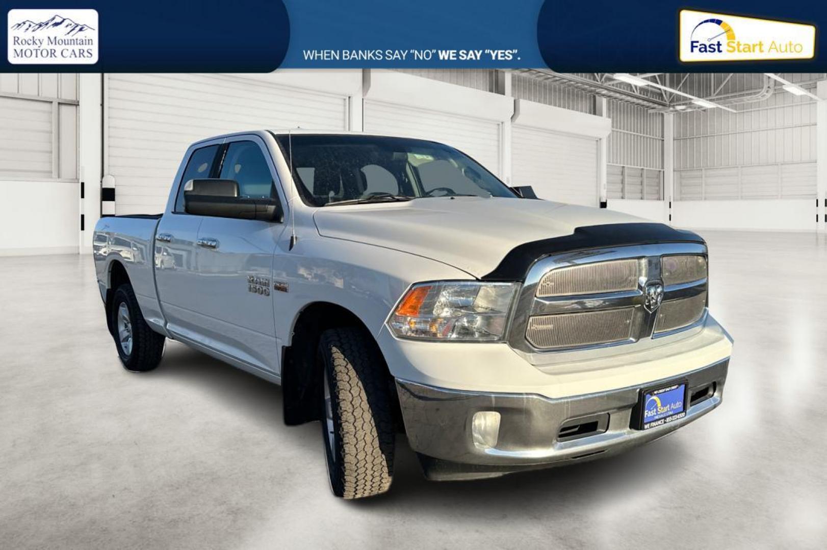 2014 White RAM 1500 SLT Quad Cab 4WD (1C6RR7GT3ES) with an 5.7L V8 OHV 16V engine, 6-Speed Automatic transmission, located at 767 S State Road, Pleasant Grove, UT, 84062, (801) 785-1058, 40.354839, -111.736687 - Photo#0