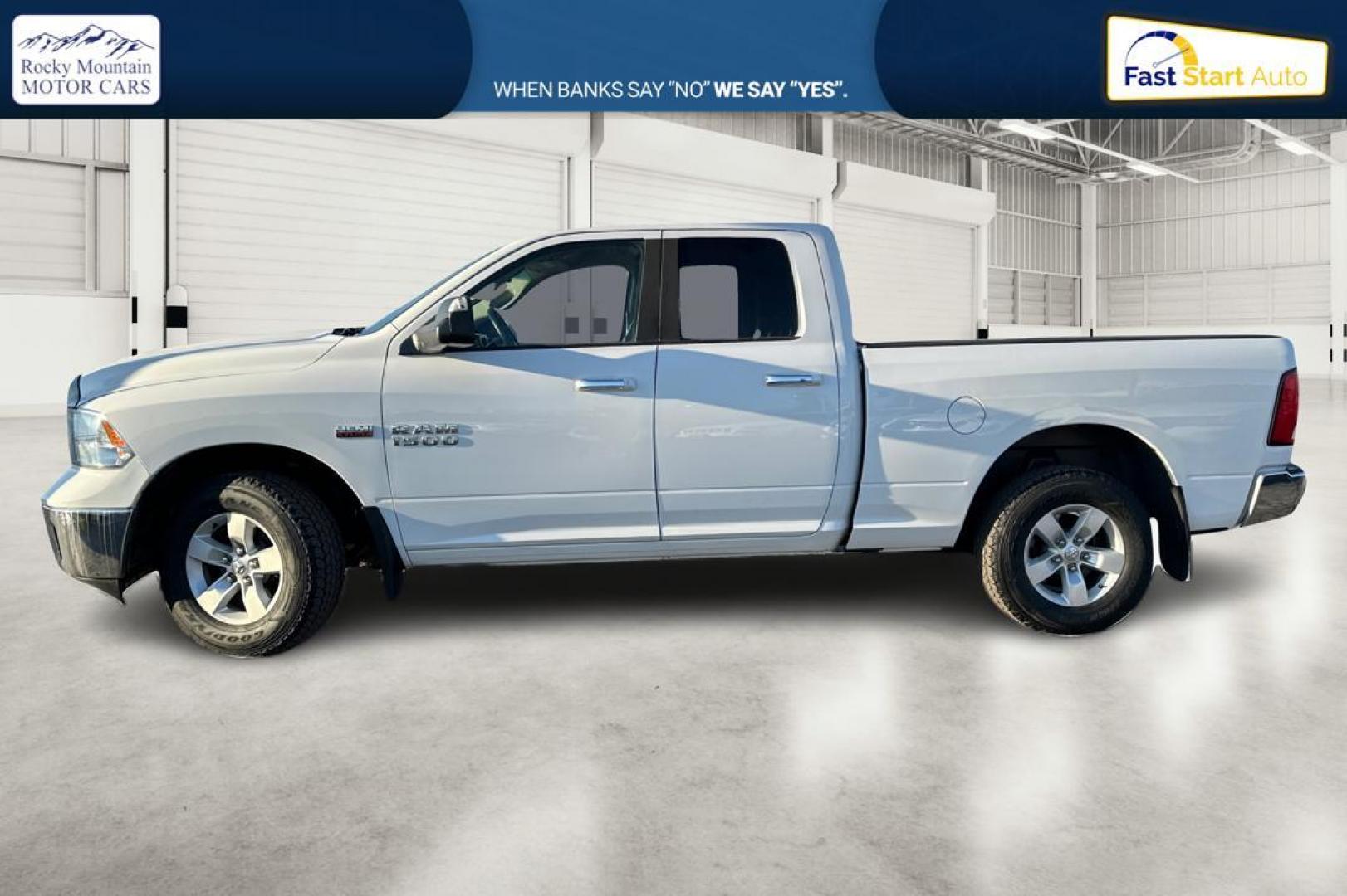 2014 White RAM 1500 SLT Quad Cab 4WD (1C6RR7GT3ES) with an 5.7L V8 OHV 16V engine, 6-Speed Automatic transmission, located at 767 S State Road, Pleasant Grove, UT, 84062, (801) 785-1058, 40.354839, -111.736687 - Photo#6