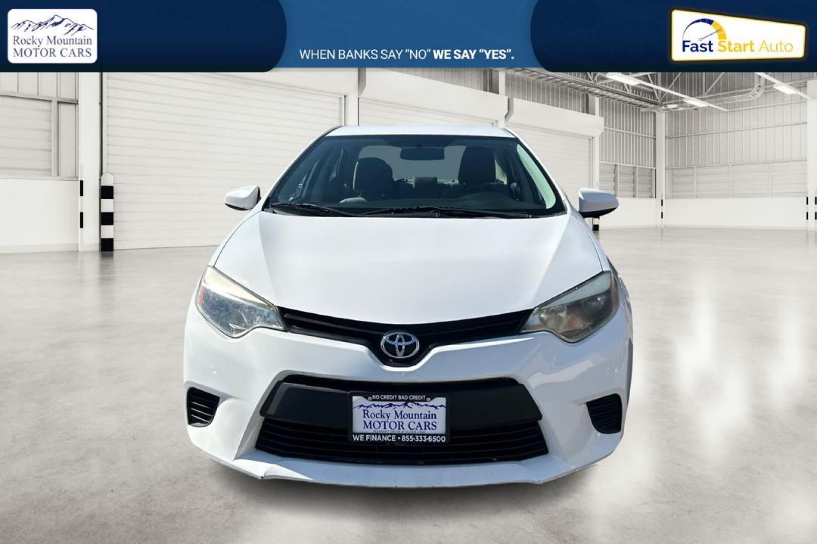 2014 White Toyota Corolla L 4-Speed AT (5YFBURHE1EP) with an 1.8L L4 DOHC 16V engine, 4-Speed Automatic transmission, located at 344 S Washington Blvd, Ogden, UT, 84404, (801) 399-1799, 41.255482, -111.970848 - Photo#9