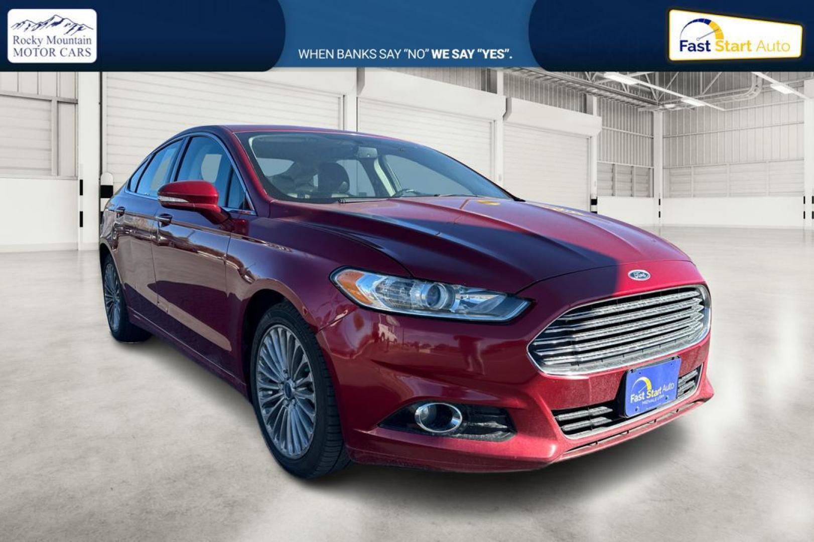 2015 Red Ford Fusion Titanium AWD (3FA6P0D90FR) with an 2.0L L4 DOHC 16V engine, Auto, 6-Spd w/SelShft transmission, located at 7755 State Street, Midvale, UT, 84047, (801) 753-9063, 40.610329, -111.890656 - Photo#0