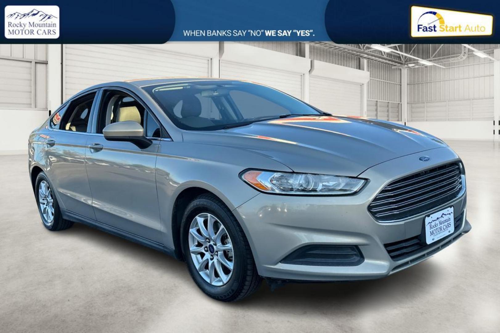 2015 Gray Ford Fusion S (3FA6P0G77FR) with an 2.5L L4 DOHC 16V engine, Auto, 6-Spd w/SelShft transmission, located at 344 S Washington Blvd, Ogden, UT, 84404, (801) 399-1799, 41.255482, -111.970848 - Photo#0