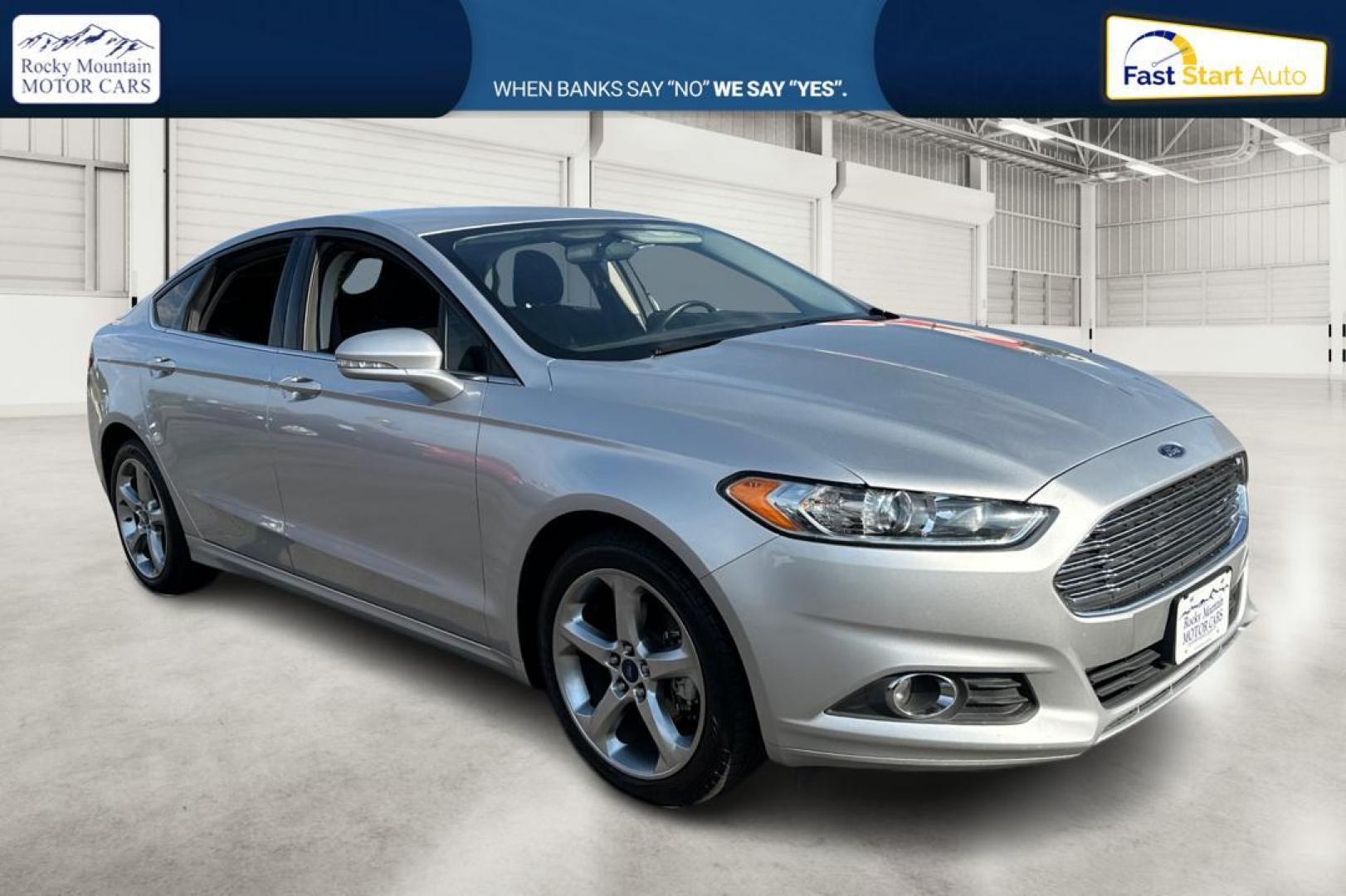 2015 Silver Ford Fusion SE (3FA6P0H99FR) with an 2.0L L4 DOHC 16V engine, Auto, 6-Spd w/SelShft transmission, located at 344 S Washington Blvd, Ogden, UT, 84404, (801) 399-1799, 41.255482, -111.970848 - Photo#0