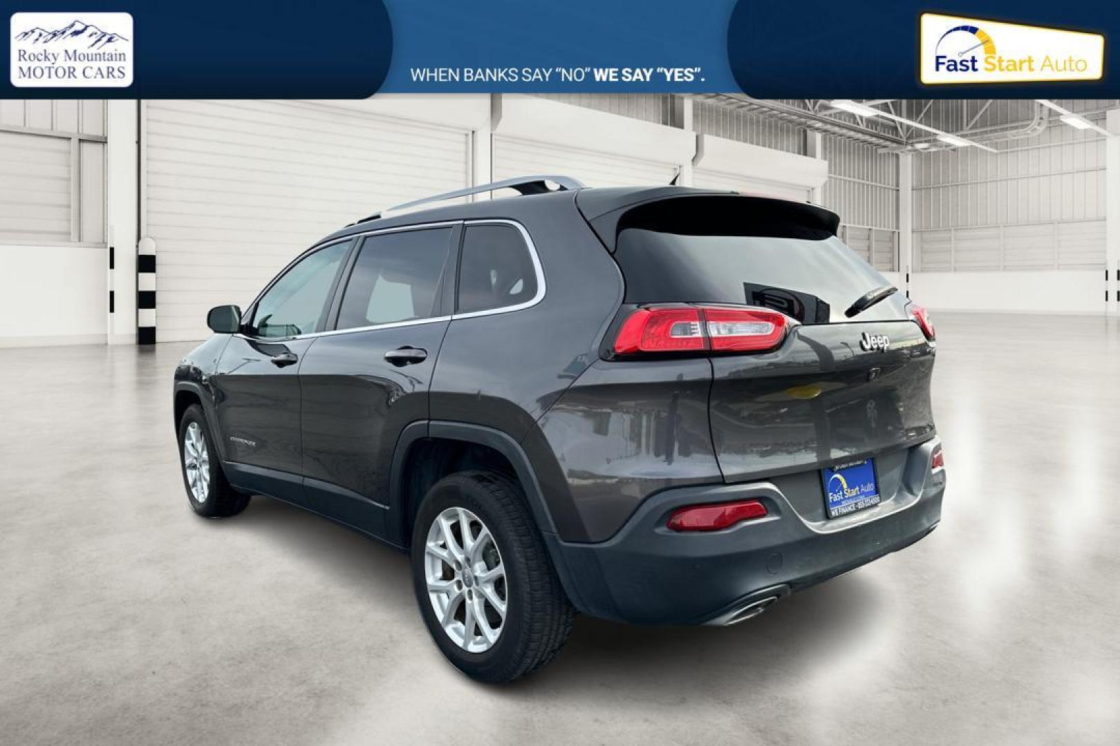 2015 Gray Jeep Cherokee Latitude FWD (1C4PJLCS0FW) with an 3.2L V6 DOHC 24V engine, 9-Speed Automatic transmission, located at 7755 State Street, Midvale, UT, 84047, (801) 753-9063, 40.610329, -111.890656 - Photo#5