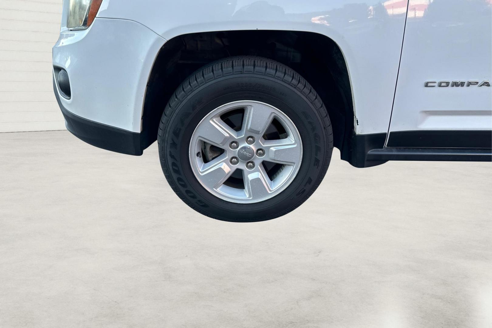 2015 White Jeep Compass Sport FWD (1C4NJCBA4FD) with an 2.0L L4 DOHC 16V engine, Automatic, CVT transmission, located at 344 S Washington Blvd, Ogden, UT, 84404, (801) 399-1799, 41.255482, -111.970848 - Photo#12