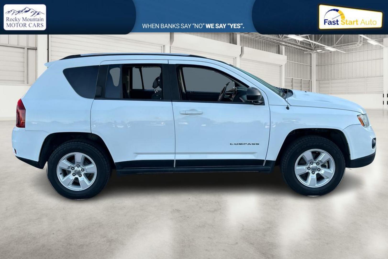 2015 White Jeep Compass Sport FWD (1C4NJCBA4FD) with an 2.0L L4 DOHC 16V engine, Automatic, CVT transmission, located at 344 S Washington Blvd, Ogden, UT, 84404, (801) 399-1799, 41.255482, -111.970848 - Photo#1