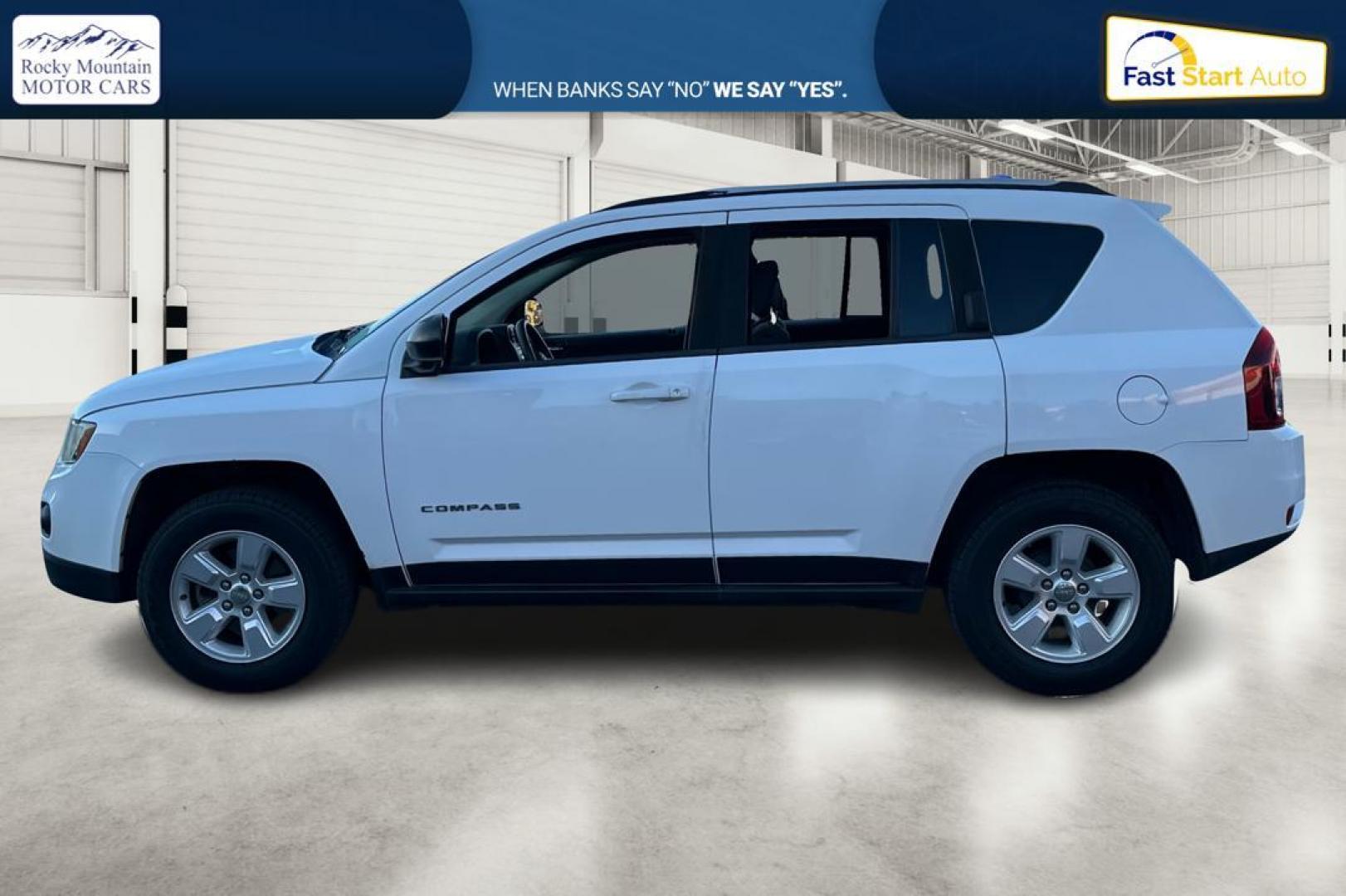 2015 White Jeep Compass Sport FWD (1C4NJCBA4FD) with an 2.0L L4 DOHC 16V engine, Automatic, CVT transmission, located at 344 S Washington Blvd, Ogden, UT, 84404, (801) 399-1799, 41.255482, -111.970848 - Photo#6